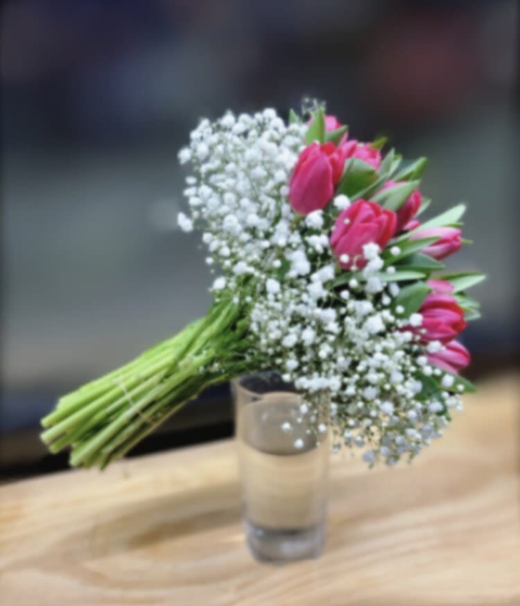 True Tulips - Take a look at these pretty bunch of tulips mixed with baby’s breath.  Vase sold separately.