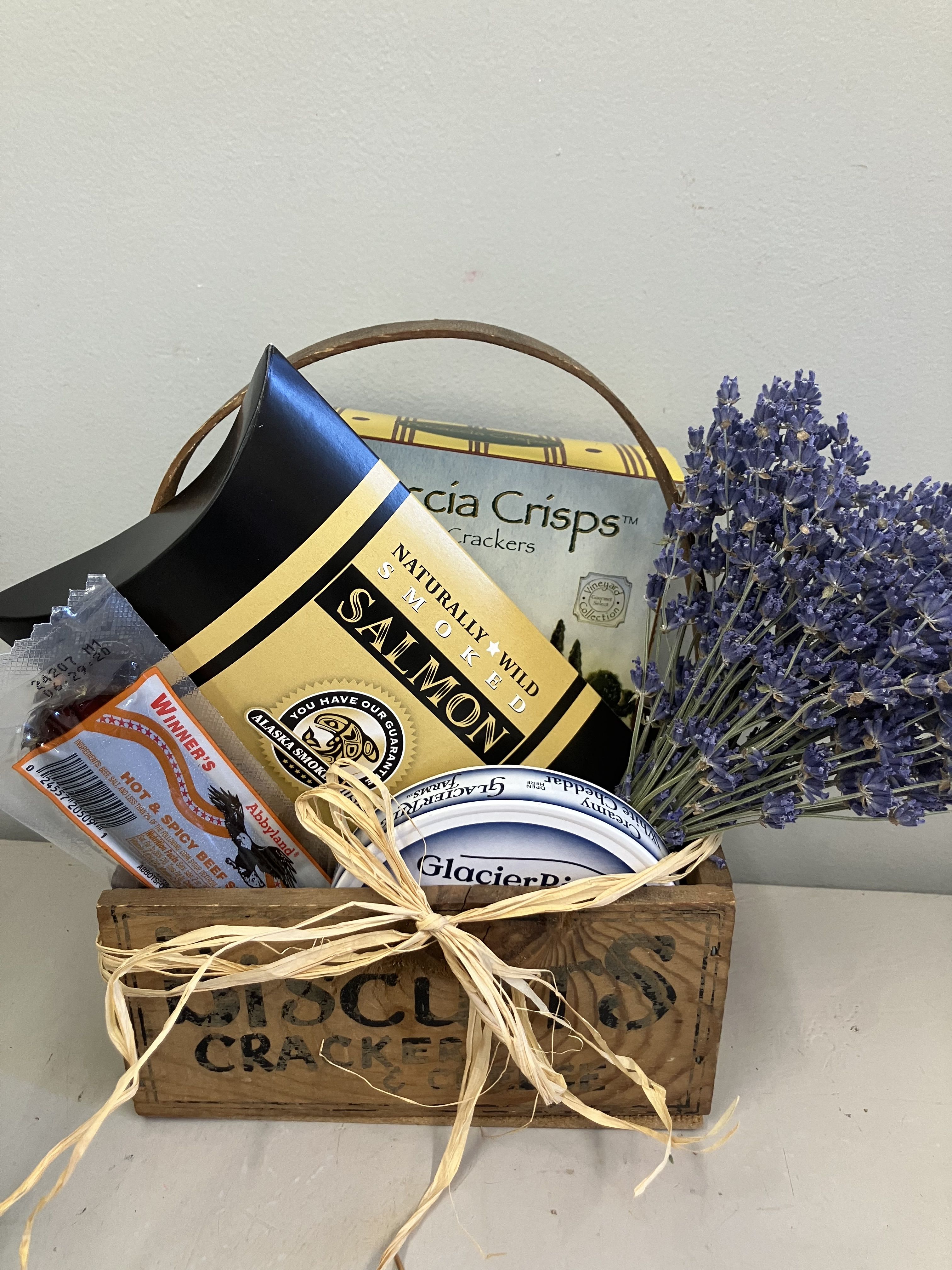 Snack Box Snack Box - Savory snacks like crackers, cheese, salmon and spicy summer sausage make a fun pick me up gift along with fragrant lavender!