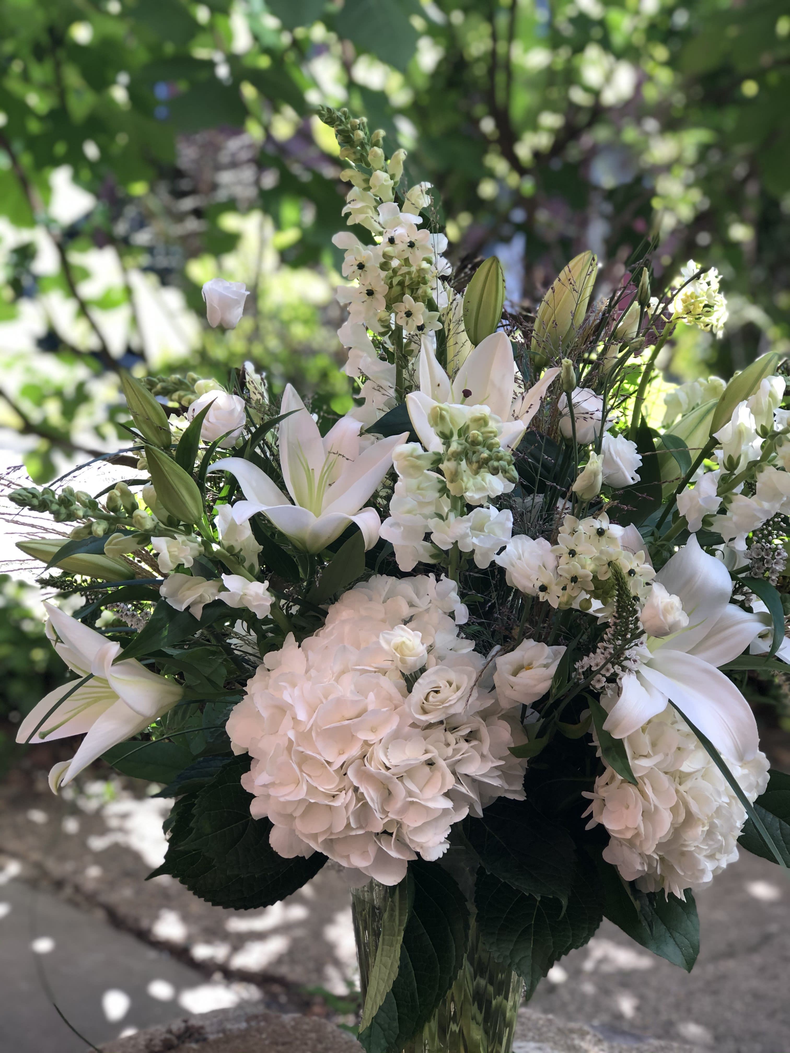 Elegance: Lilies, hydrangeas and other selected blooms Elegance: Lilies, hydrangeas and other selected blooms - A beautiful and elegant collection of all white blossoms featuring lilies and hydrangeas among others.