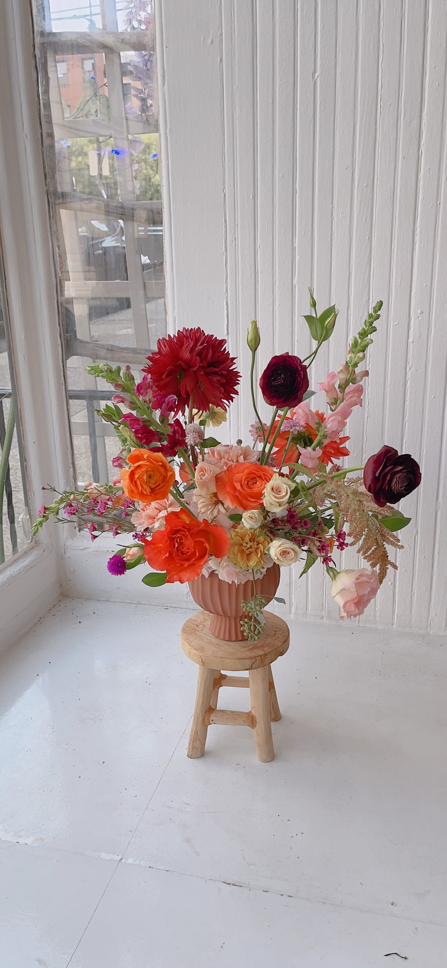 Fall Dreams Fall Dreams - Dahlias, roses, and zinnias - the perfect trio for fall.  A timeless arrangement crafted in a clay vase.