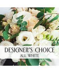 All White Designers Choice All White Designers Choice - Our designers will create a beautiful soft and serene mixed flower arrangement that's just right for your occasion. Perfect of an elegant occasion or appropriate for sending your condolences.