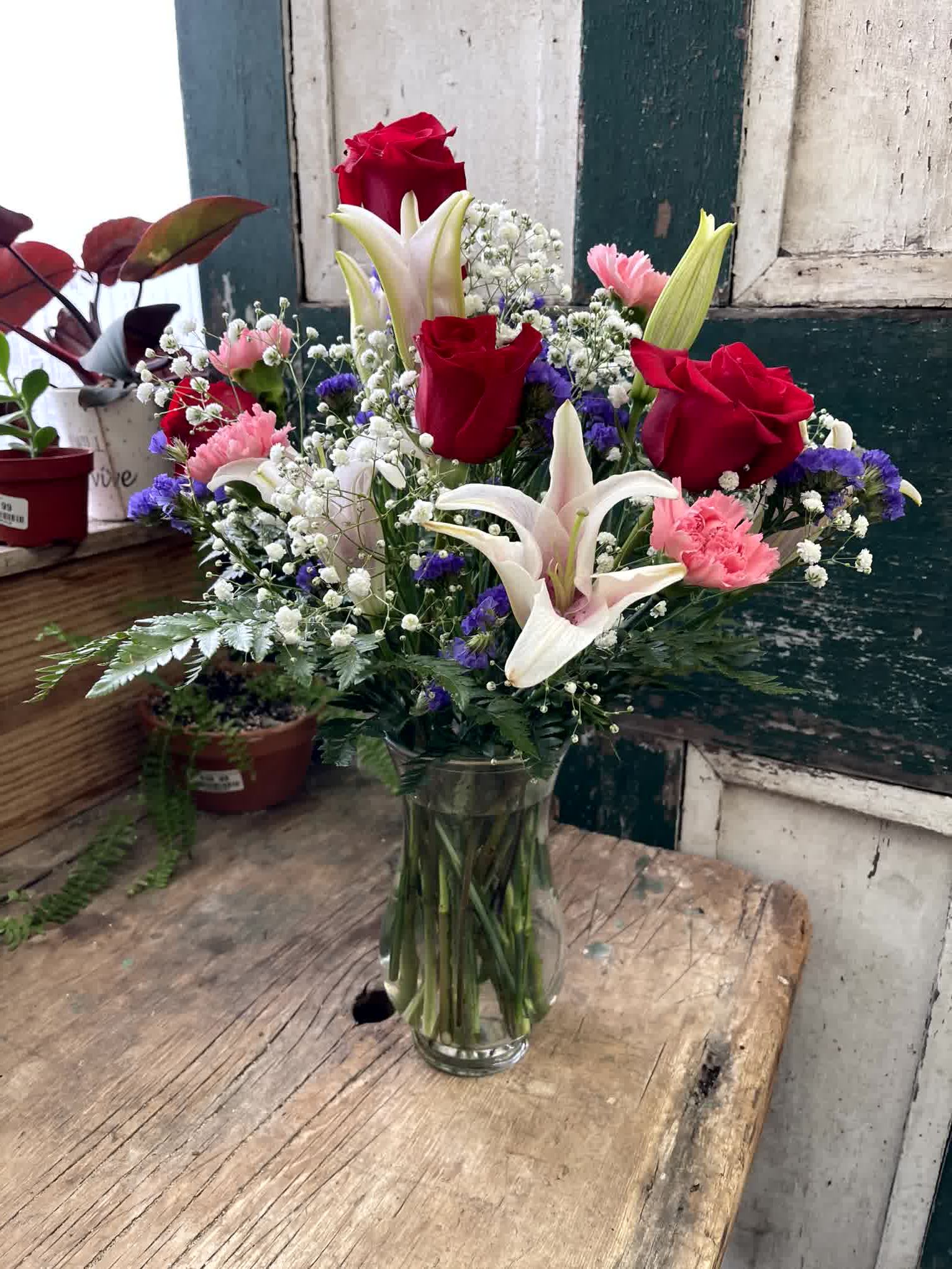 From the Garden From the Garden - Does someone you know need a pick-me-up? Lift their spirits – and make the day special – by sending this charming display of blushing blossoms in shades of pink, red and purple. It’s the perfect all-occasion, fresh-from-the-garden bouquet.