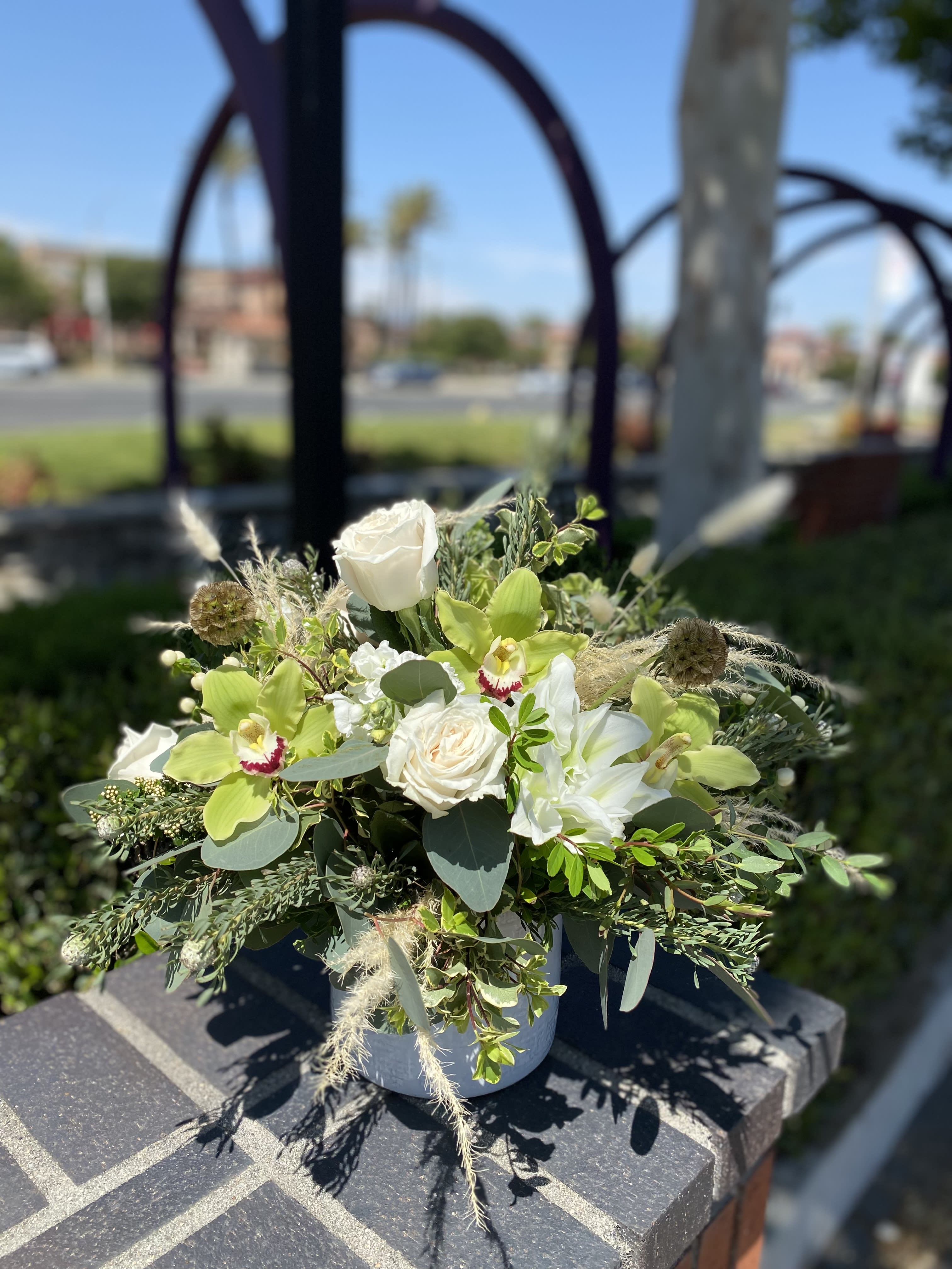 Classy boho - Classy Boho all white flowers includes roses stargazer lilies stock bunny tail pampas grass verity of foliage eucalyptus and orchids 