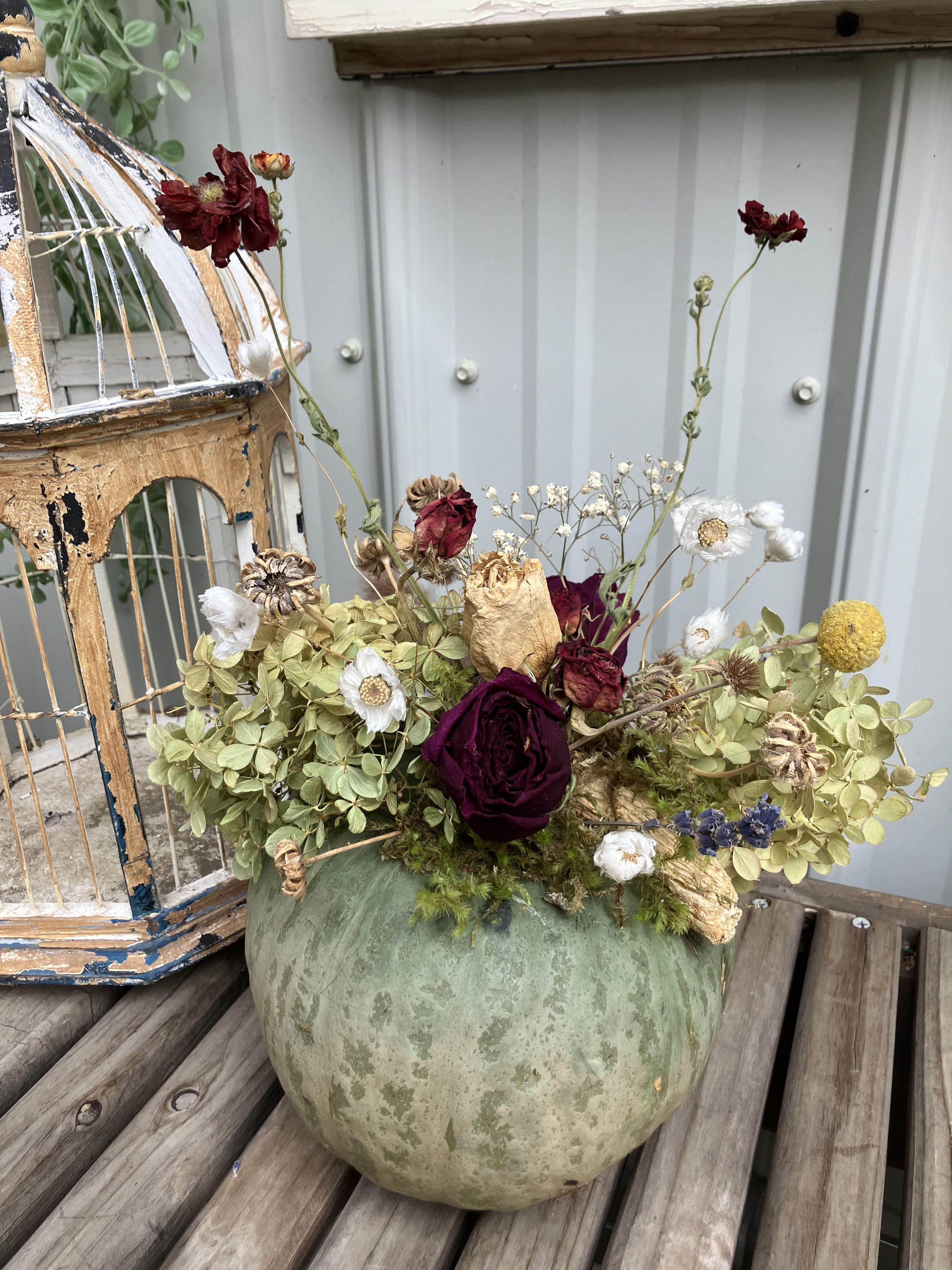 Decorative Pumpkin Decorative Pumpkin - A dusky green pumkin with dried flowers will make a pleasing and long lasting fall decoration