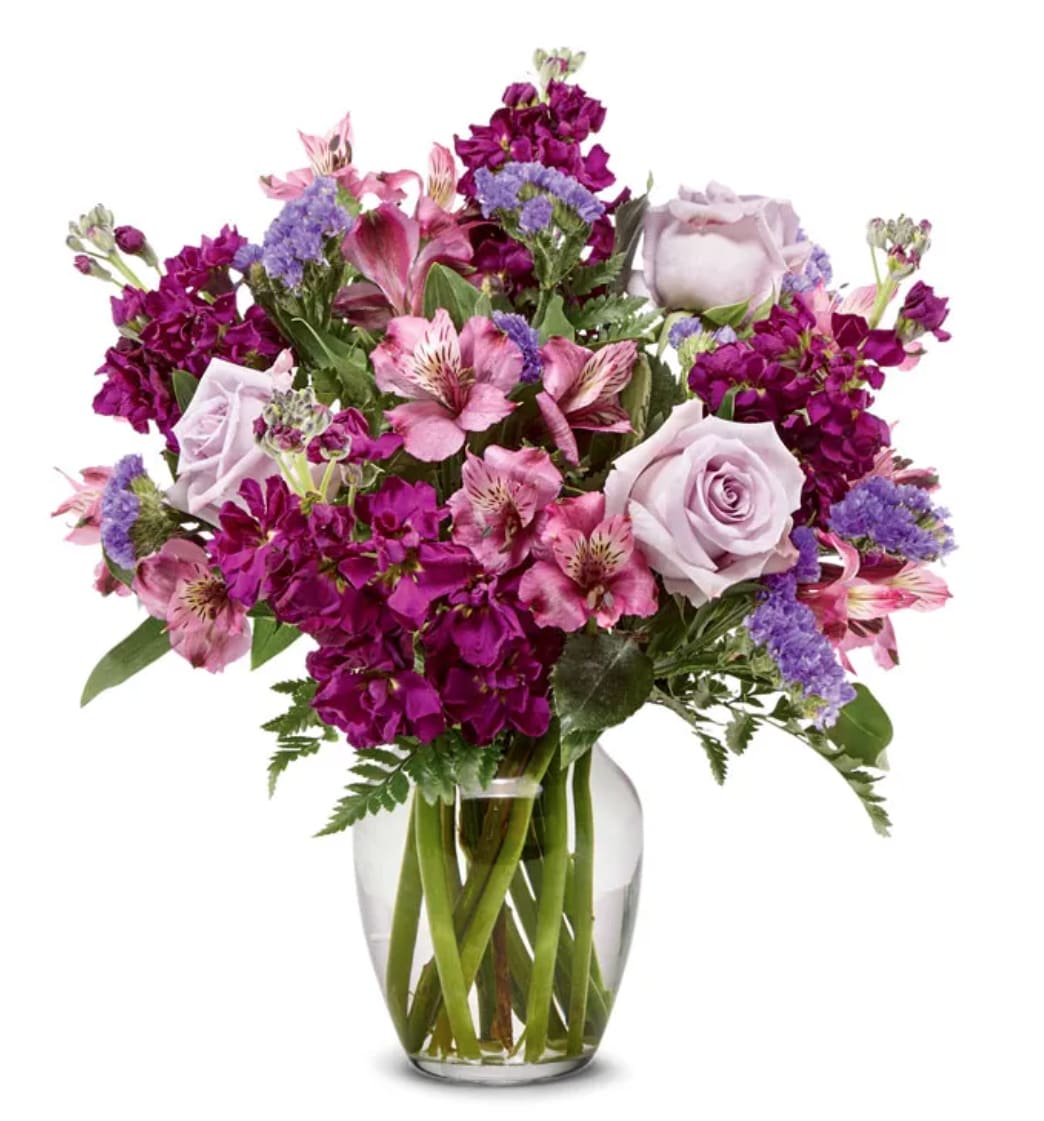 Lavender Burst Lavender Burst - Lavender roses and alstro, statice and a stock/liatris in a vase!