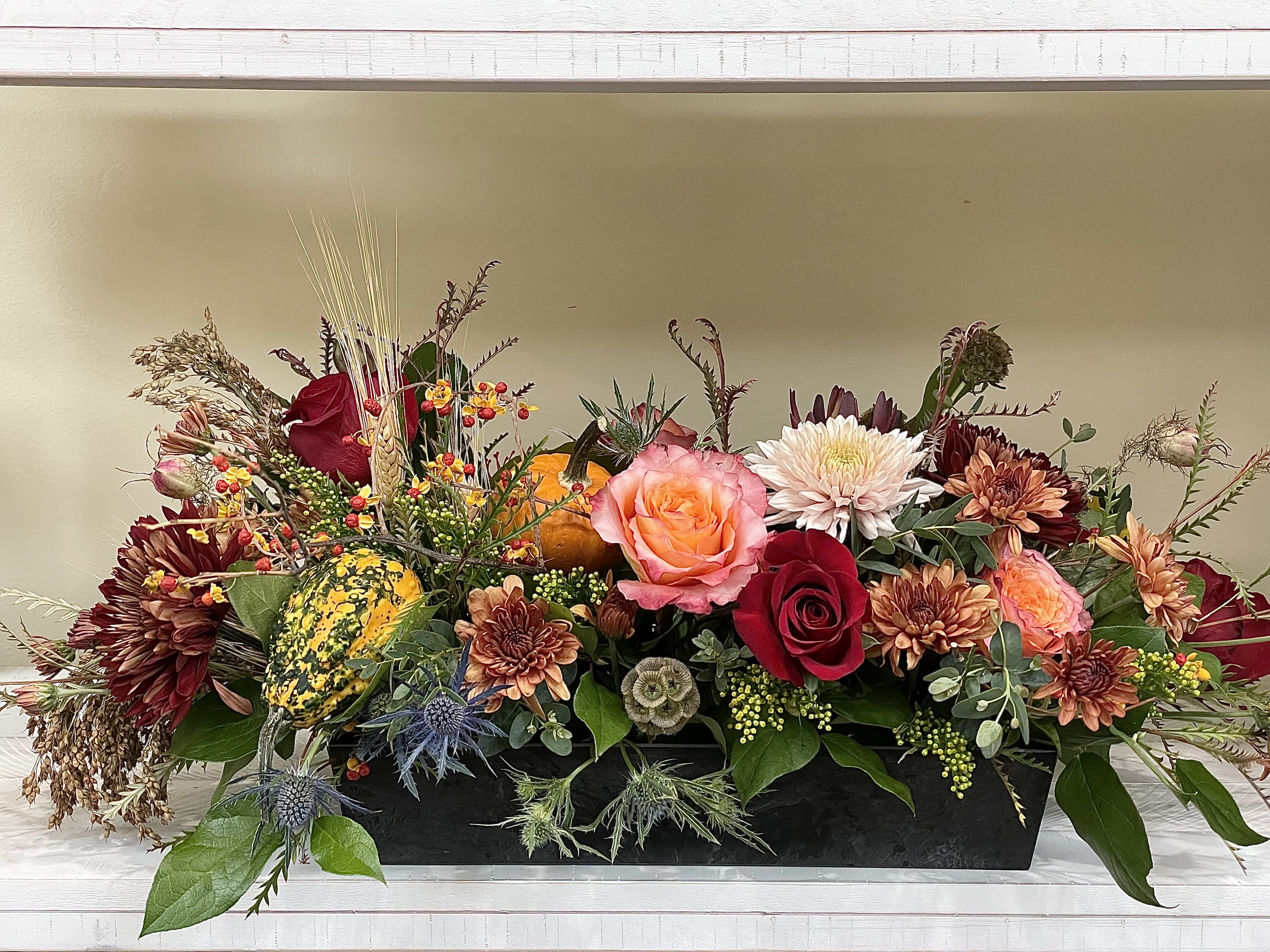 Delux Thanksgiving Centerpiece - Beautiful classic Thanksgiving centerpiece, designed with classic colors to match any table setting. We included some interesting natural elements. Perfect to order for the family you are spending Thanksgiving with.