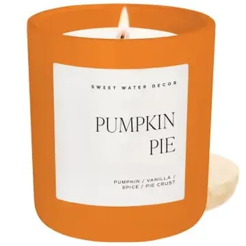 Pumpkin Pie 15 oz Soy Candle Pumpkin Pie 15 oz Soy Candle - Capture the sweet, nostalgic aroma of pumpkin pie with our Hello Pumpkin fragrance. A customer favorite for the season, it’s perfect for Halloween, Thanksgiving, and thoughtful housewarming gifts. Pair it with coordinating seasonal drinkware and decor to create an inviting, cohesive display your customers will love. SCENT NOTES: • Top: Pumpkin • Middle: Warm Spices, Vanilla • Base: Whipped Cream, Buttery Pie CANDLE INFO: • Size: 15oz | 334g Net Weight | 3.25x3.63x4" • Burn Time: 70+ Hours • Wood lid included • Wick: 100% Cotton (Lead and Zinc Free) • Wax: Proprietary Soy Based Wax Blend | Vegan, Non-GMO, Kosher • Premium Fragrance Oil • Gluten Free, Phthalate Free, Non-Toxic • Made in Pittsburgh, PA • Style No. CL139
