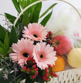 Fruit and Flower Fruit and Flower - Select a lovely combination of both fresh fruit and a flower arrangement or plant. Very popular item for college students and sympathy.