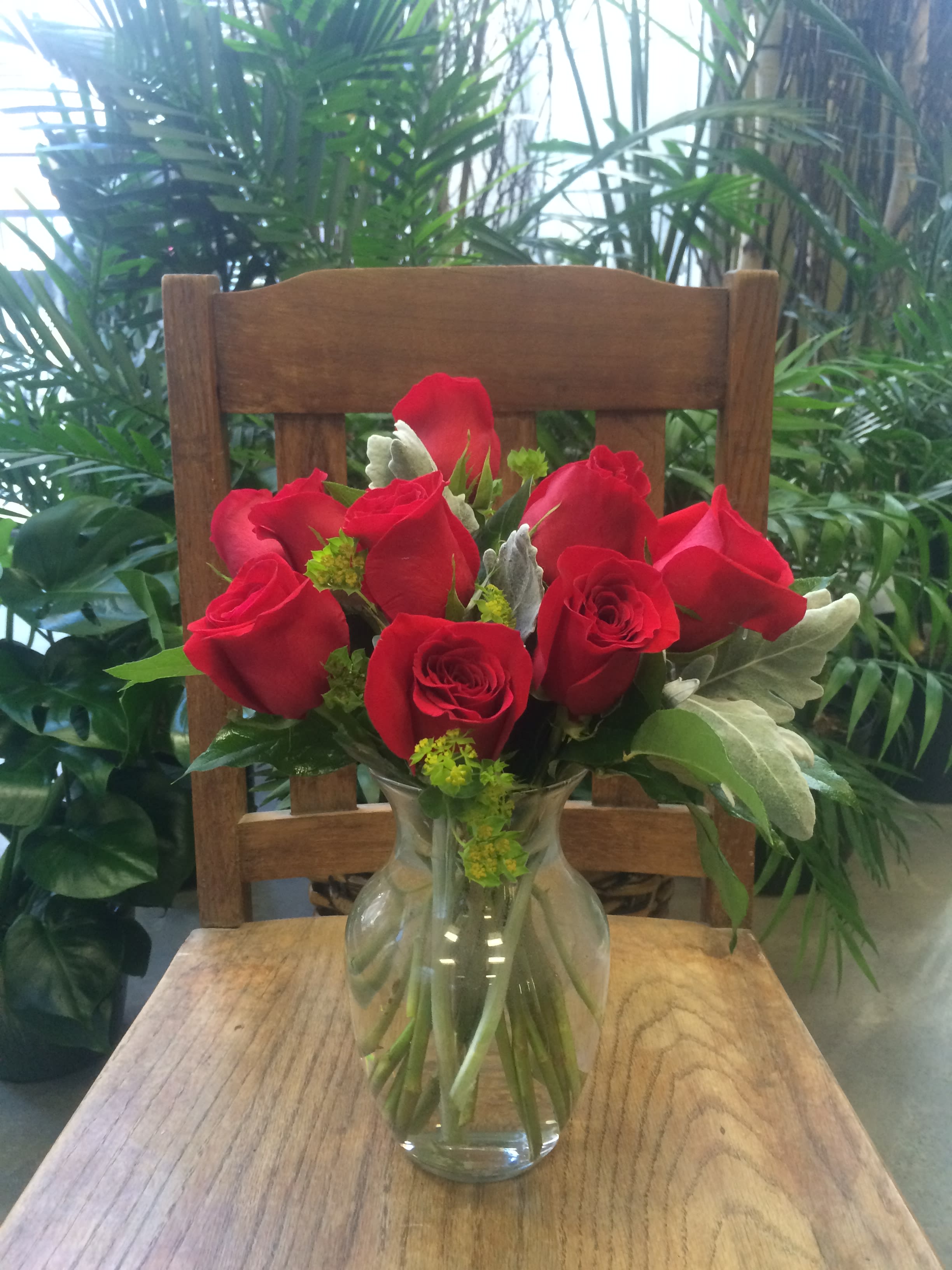 *SPECIAL* Dozen Short Stem Roses *SPECIAL* - A dozen beautiful short stem roses in a clear glass vase with assorted greenery.  RED ONLY Approximately 13&quot; to 15&quot; tall