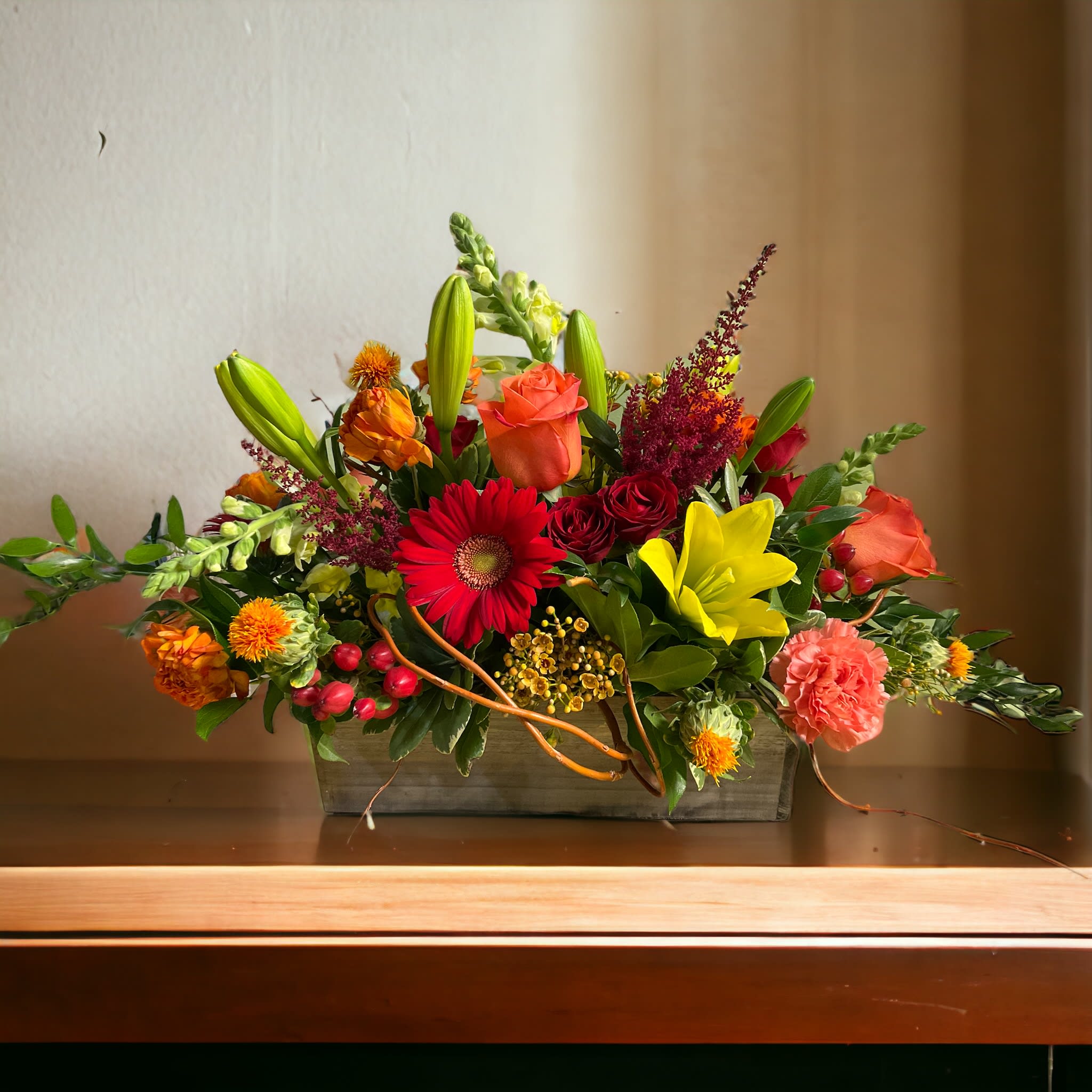 Autumn Bounty Autumn Bounty - The perfect compliment to the holiday table. A beautiful bouquet of the seasons freshest flowers designed in our popular barnwood box.