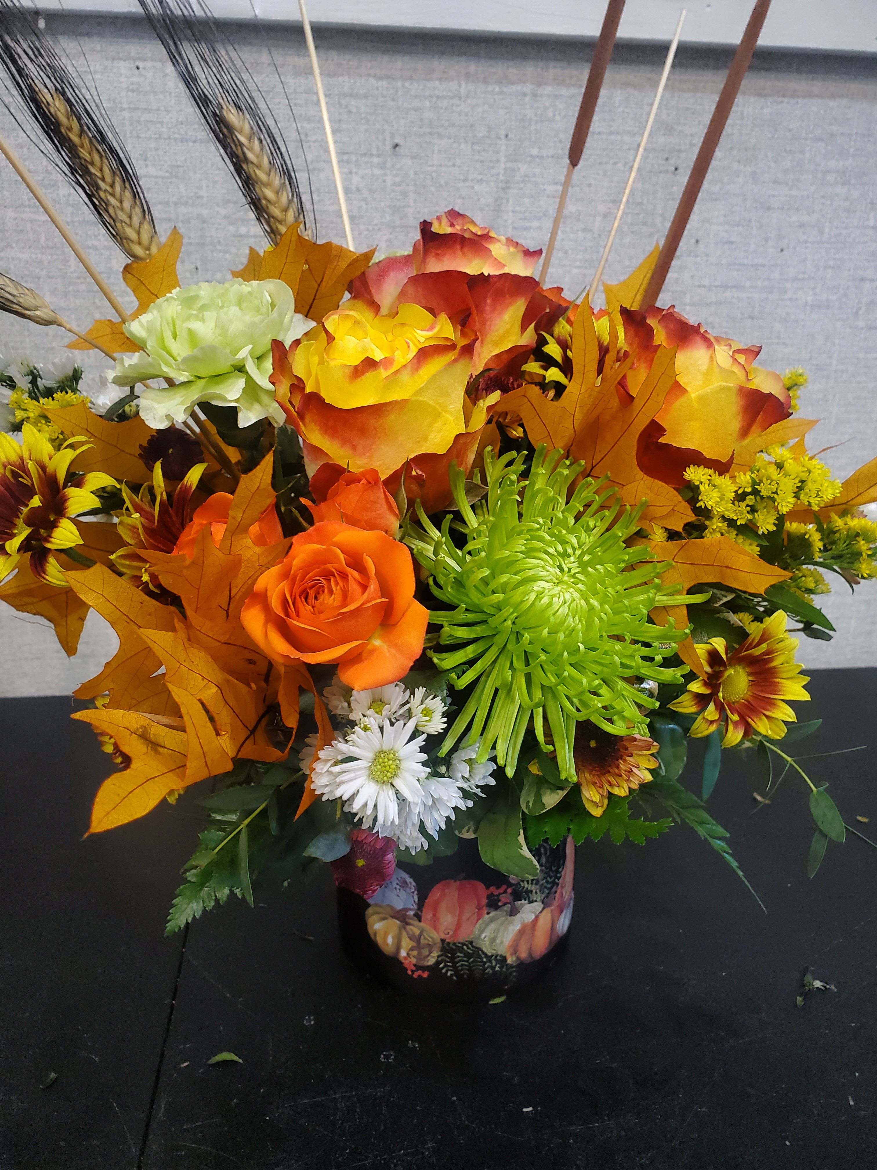 PUMPKIN OF FALL PUMPKIN OF FALL - CYLINDER WITH PUMKINS FILLED WITH FRESH FALL FLOWERS ** COLORS OF CYLINDER MAY VARY**