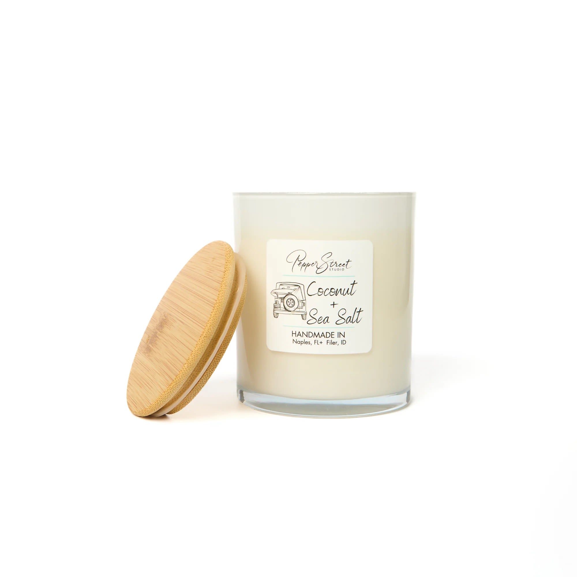 COCONUT + SEA SALT CANDLE COCONUT + SEA SALT CANDLE - Experience eco-conscious luxury with Pepper Street's 13-ounce soy wax candle. Crafted with toxin-free fragrances, it provides a clean, safe burn. The wood wick adds natural elegance and a subtle crackle for peacefulness and tranquility. Ideal for those who value high-quality, sustainable products. Burn time is 80+ hours. For best results, burn the candle for 2-3 hours until the wax melts evenly. Always trim the wick before lighting. Coconut + Sea Salt Rejuvenate with sweet coconut and salty sea salt, with a hint of orchid.