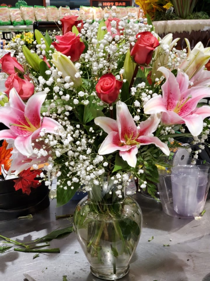Lillies & Roses Lillies & Roses - Our best quality hand selected Dozen roses and three stems of lilies