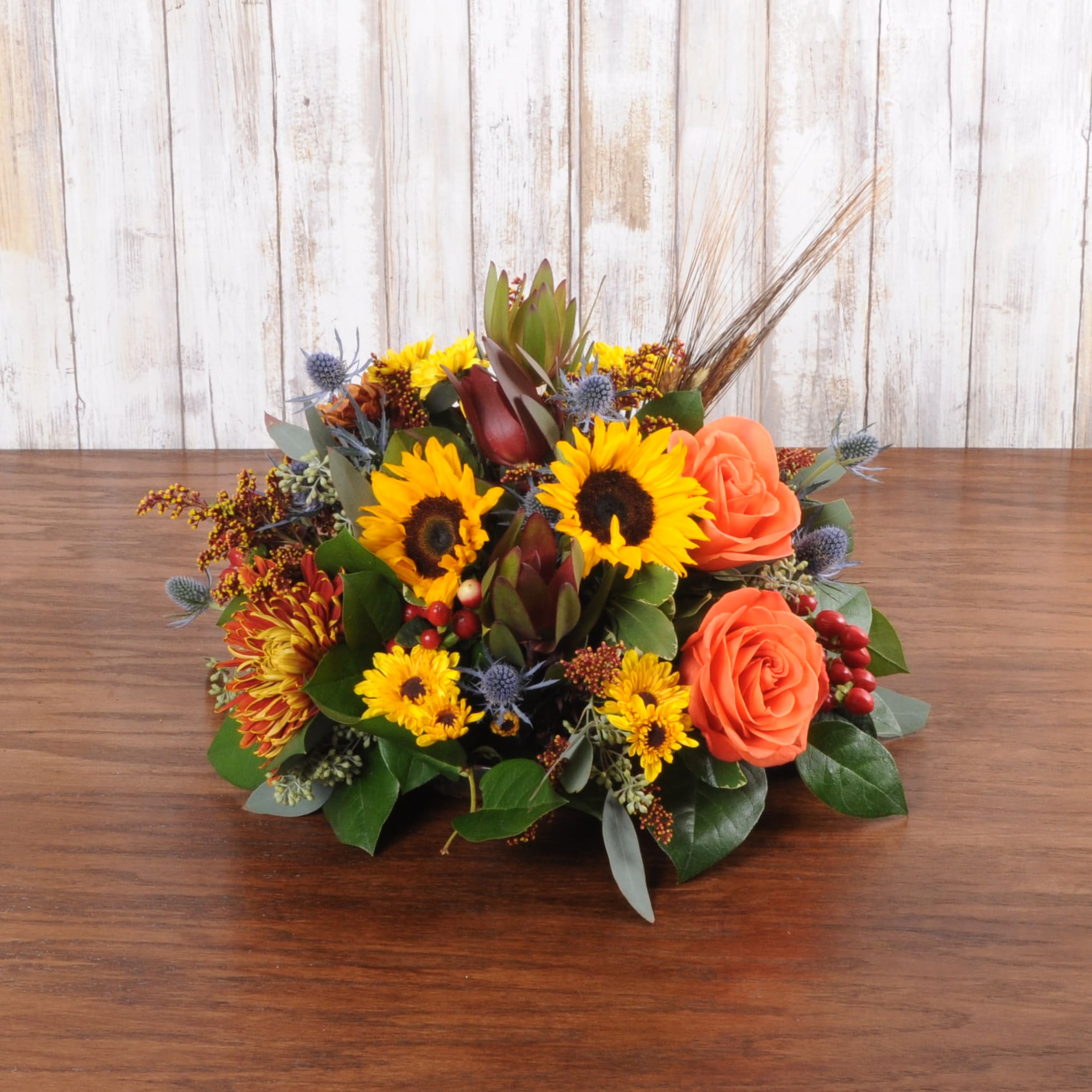 Bountiful Autumn Bountiful Autumn - Traditional thanksgiving centerpiece with no candle. Perfect for a small to medium sized holiday table.
