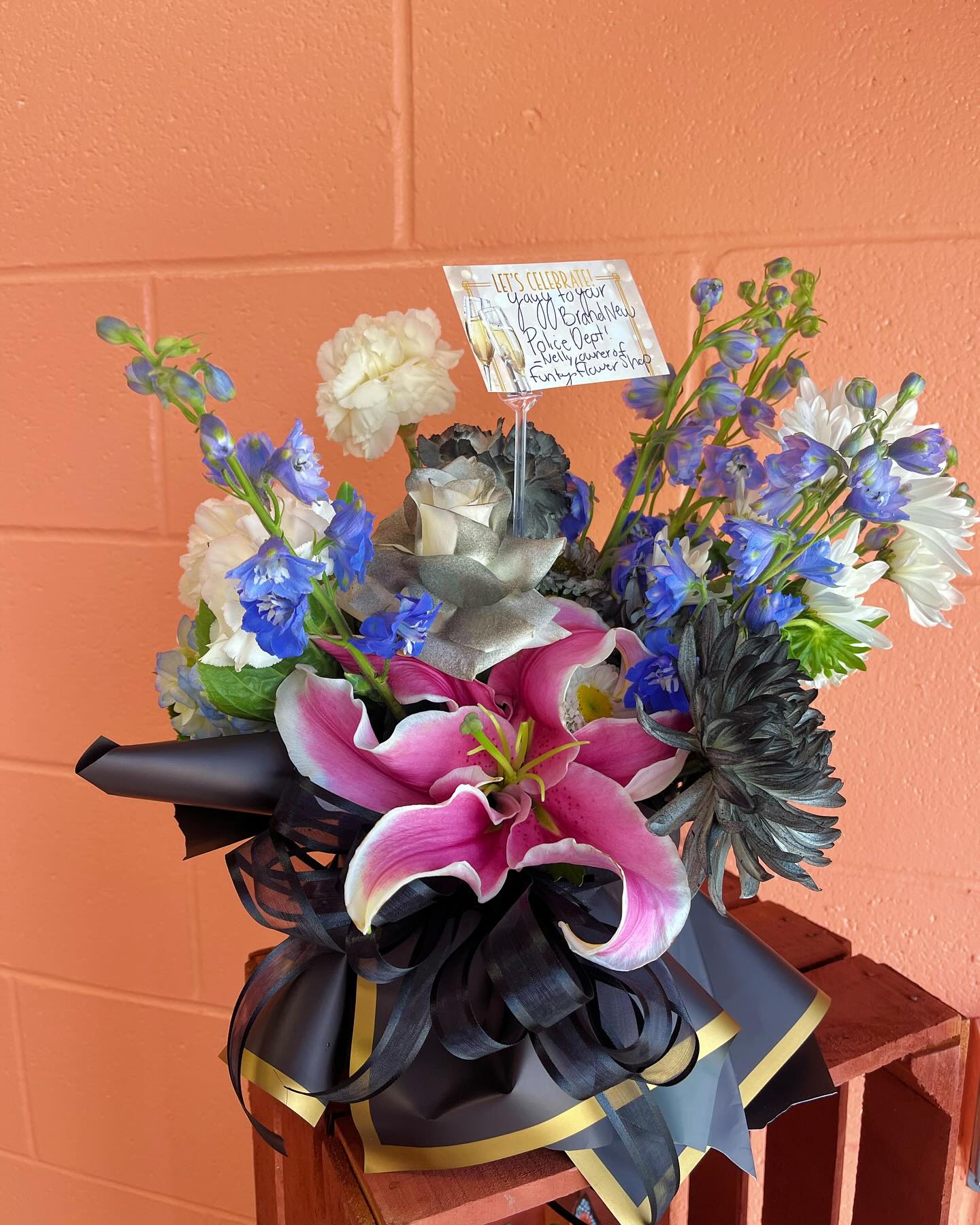 amazing boss bouquet - small floral bouquet in black white and blue; with just a touch of pink; perfect gift for someone who has a strong leadership presence.