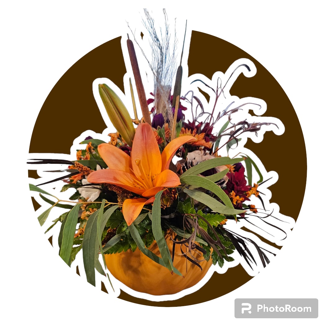 Orange Pumpkin Arrangement Orange Pumpkin Arrangement - A beautiful ix of flowers in a ceramic pumpkin.