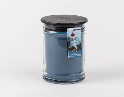 NANTUKET COAST NANTUKET COAST - Our 8oz Small Jar Candle is the perfect way to enjoy your favorite Bridgewater fragrance. This timeless glass jar includes a black wooden lid and a hangtag that features a picture of a child who is supported through our LIGHT A CANDLE · FEED A CHILD program.