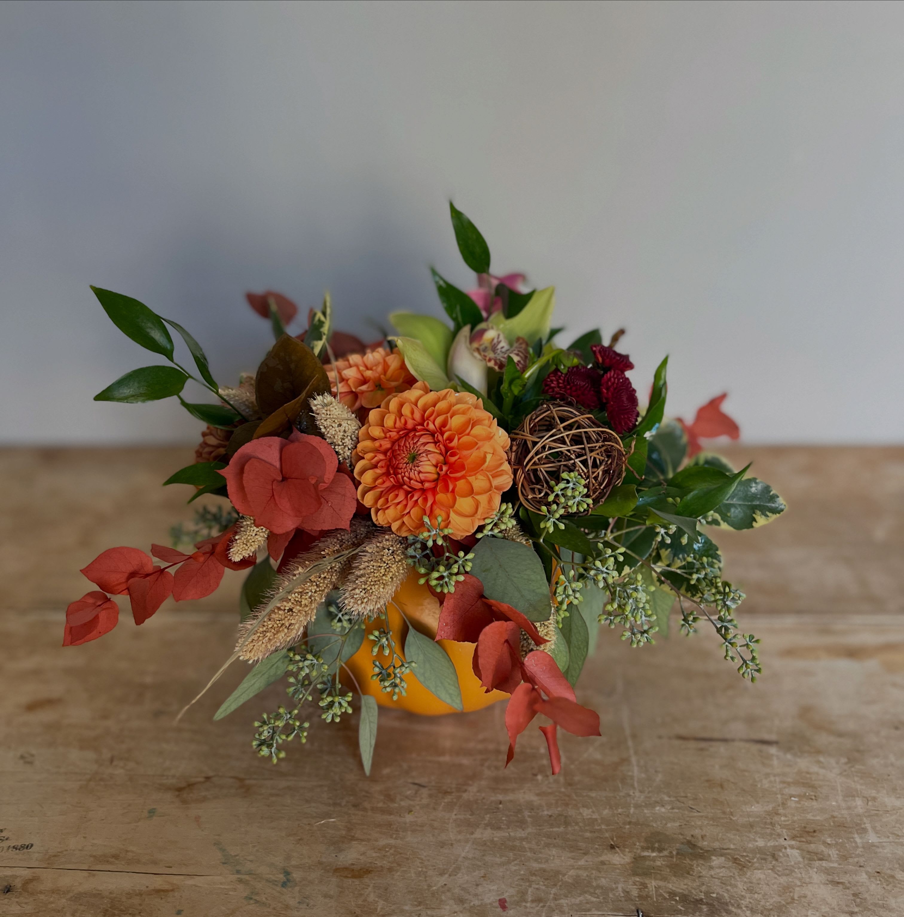 Bountiful Harvest Bountiful Harvest - Celebrate this season of bounty with a vibrant display of autumnal flowers such as roses, hypericum and calla lily. Designed in a ceramic pumpkin vessel, this arrangement is a beautiful centerpiece for your Thanksgiving table, or as a cheerful and seasonal blessing to a friend or loved one. Approx. 10x10