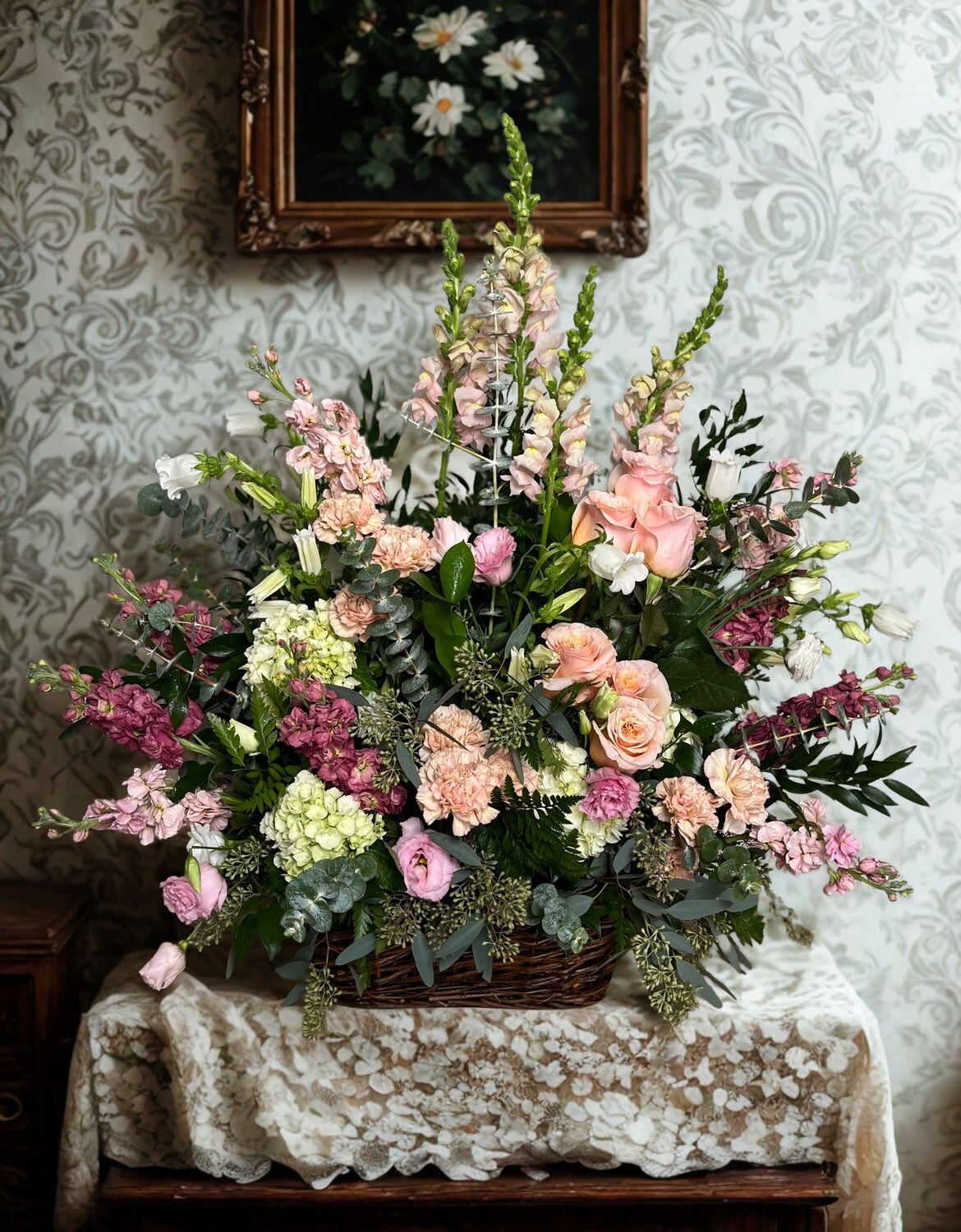 Deluxe Sympathy Expressions - Celebrate a life beautifully lived with the timeless elegance of our Deluxe Sympathy Expressions arrangement. Featuring a serene blend of spring garden snapdragons, graceful lisianthus, and lush hydrangeas, this tribute captures the essence of peace and remembrance. Perfectly designed to honor your loved one.   Also available in other color schemes, please inquire. 