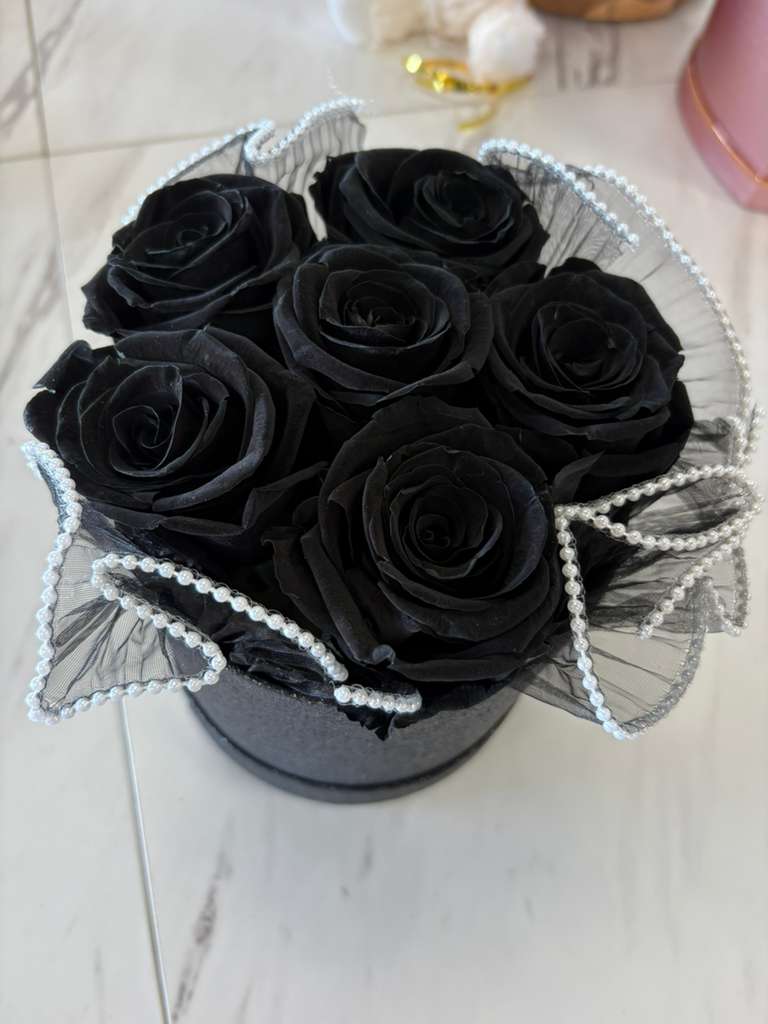 Black Eternal Roses Eternal Rose Arrangement – Elegant OC Flower Gift -  Discover the unique beauty of our black eternal roses, a symbol of mystery, strength, and sophistication. Perfect for decorating spaces with an elegant and timeless touch, these flowers require no water or care, maintaining their intense color and impeccable shape for years. Ideal for giving on special occasions, such as anniversaries, birthdays, or simply to express a deep and lasting feeling.