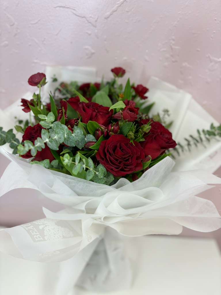 bouquet of the day  Premium Flower Arrangement – OC Florist Near Me - Beautiful bouquet of 12 Ecuadorian red roses filled with fresh foliage of different types of eucalyptus