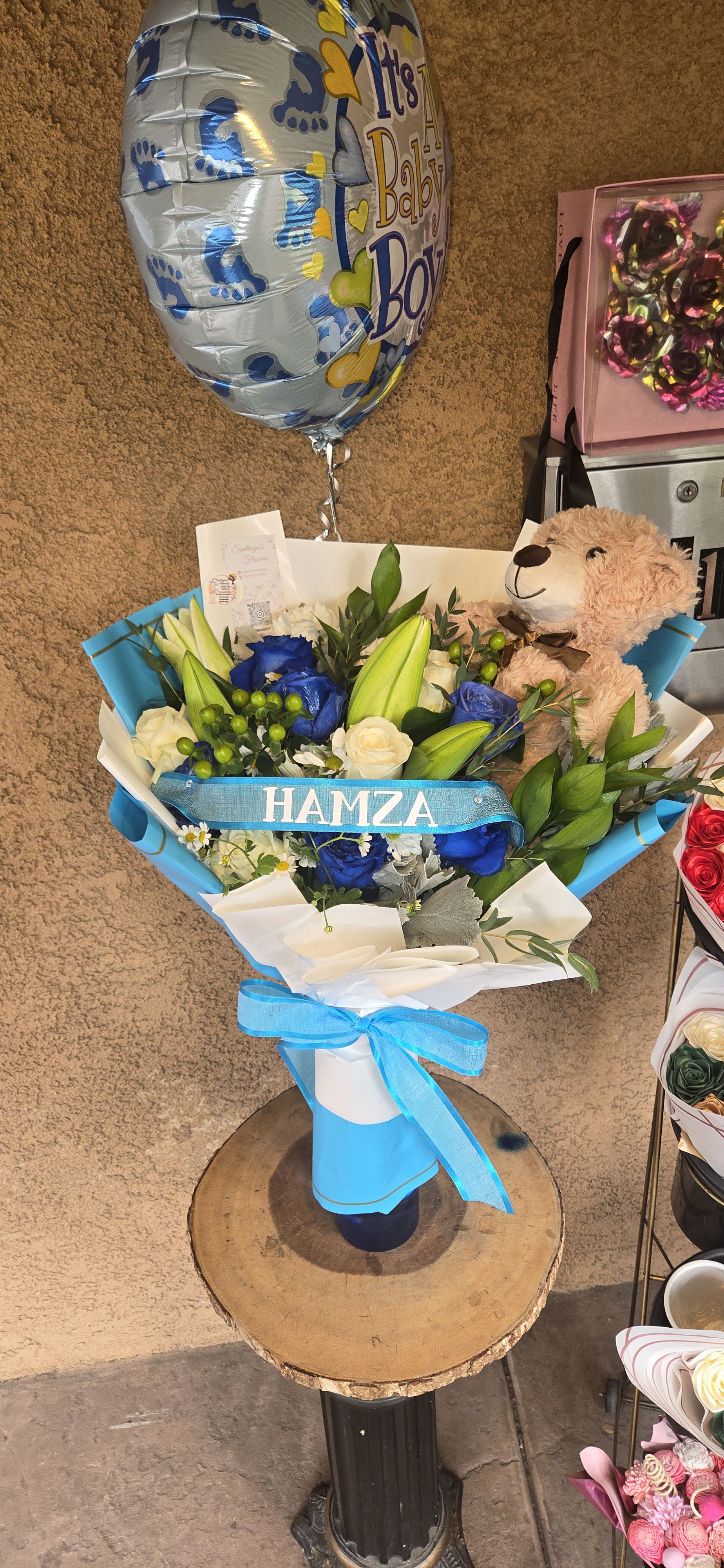 Welcome baby boy bouquet Welcome baby boy bouquet - Welcome baby boy bouquet blues and white with name of baby and bear
