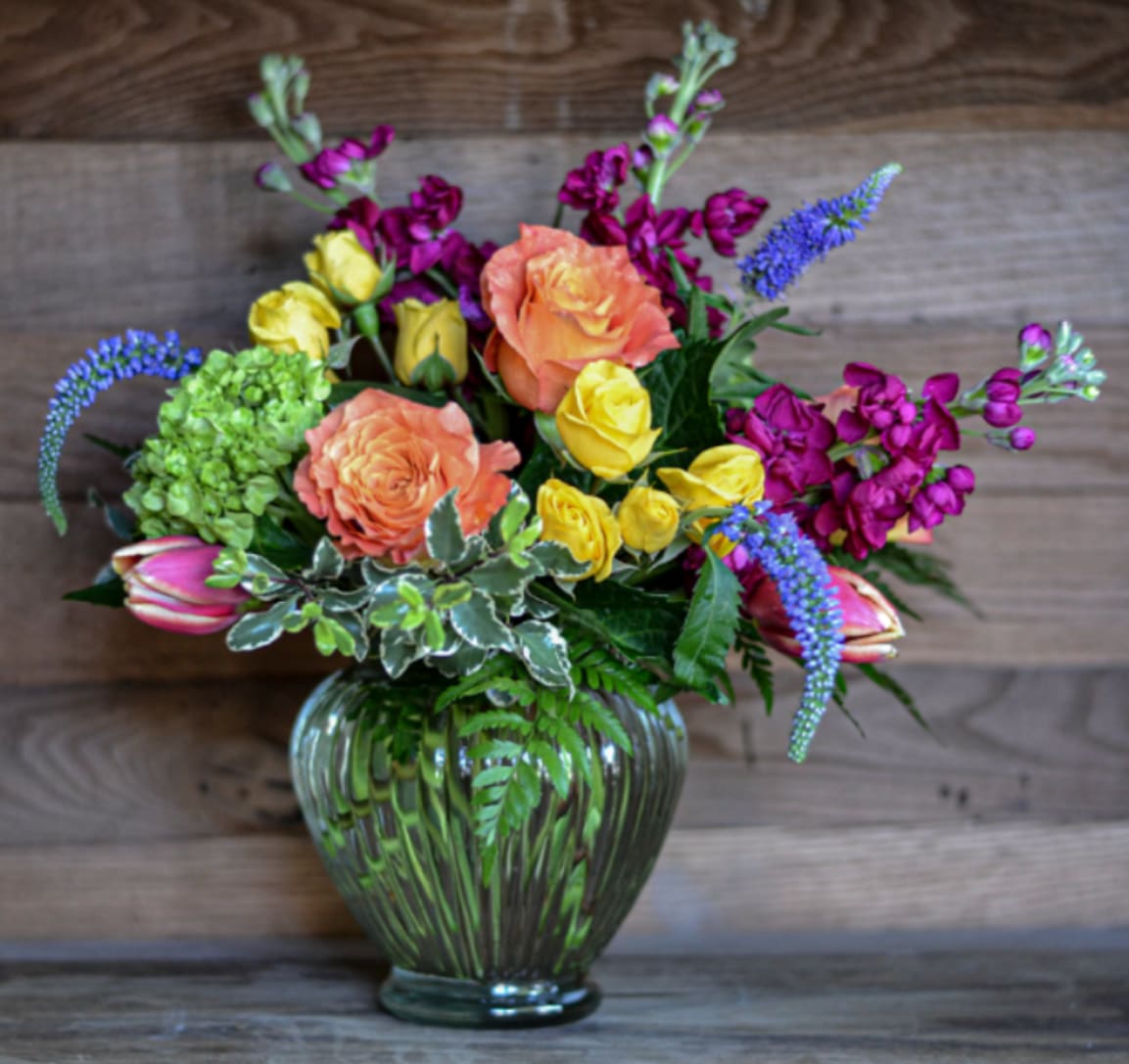 Color my World - You Color My World and I wouldn`t have it any other way! This beautiful arrangement consists of fresh spirits, spray roses and seasonal jewel toned beauties. Our Color My World bouquet is great for any occasion or relationship. Designed in a beveled ginger jar and is available in different sizes - Standard, Deluxe, Premium, and Exquisite. 