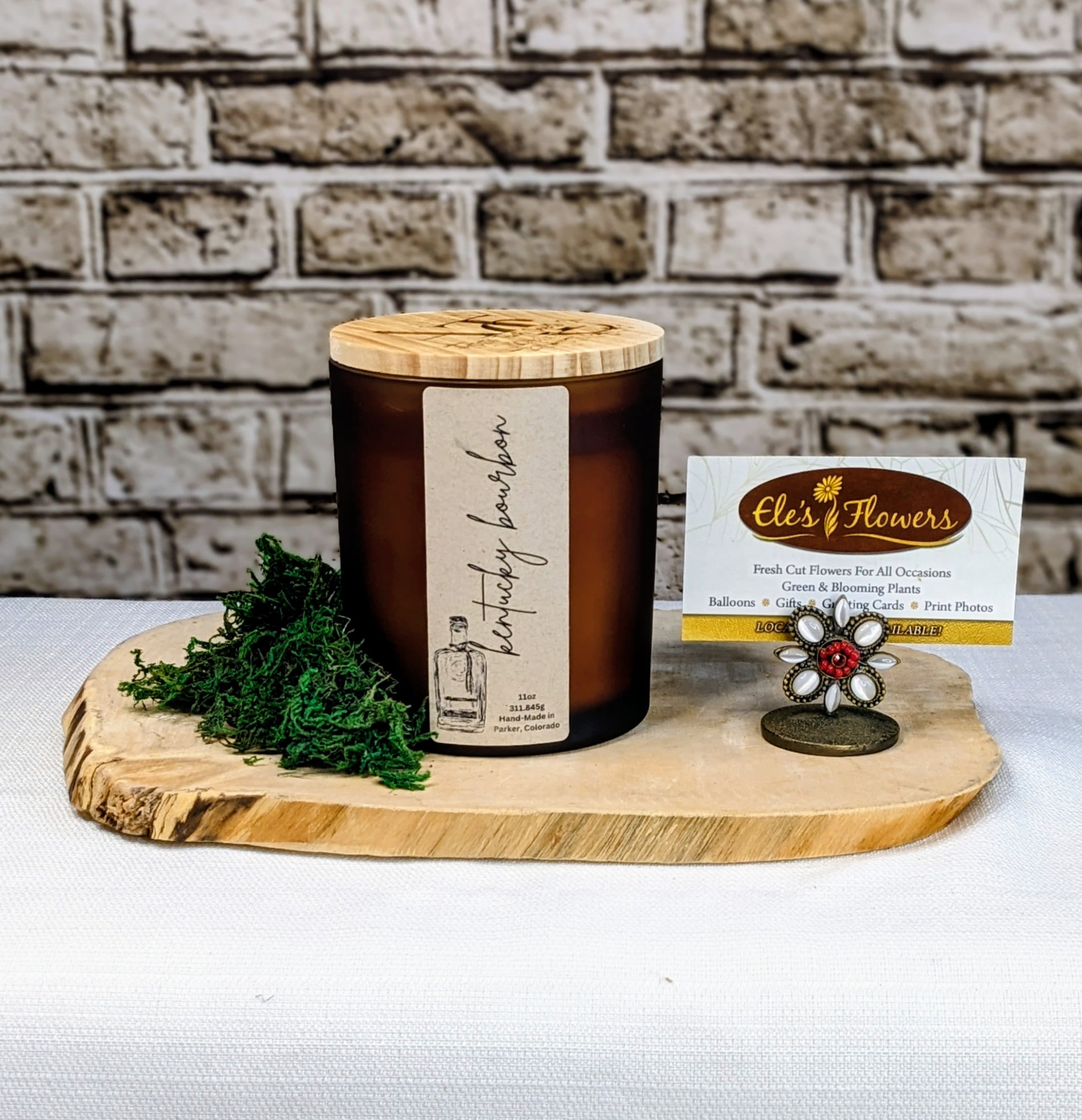 Kentucky Bourbon - Candle Kentucky Bourbon - Candle - Experience the bold and daring scent of Kentucky Bourbon with our luxurious candle. Let the aroma transport you to a place of adventure and excitement. Take a risk and indulge in the irresistible fragrance of our hand-crafted candle. Light it up and ignite your senses!  11 oz candle handmade with clean soy wax blend and a crackling cedar wood wick. Burns for up to 60-80 hours.   artistictouchcandleco.com