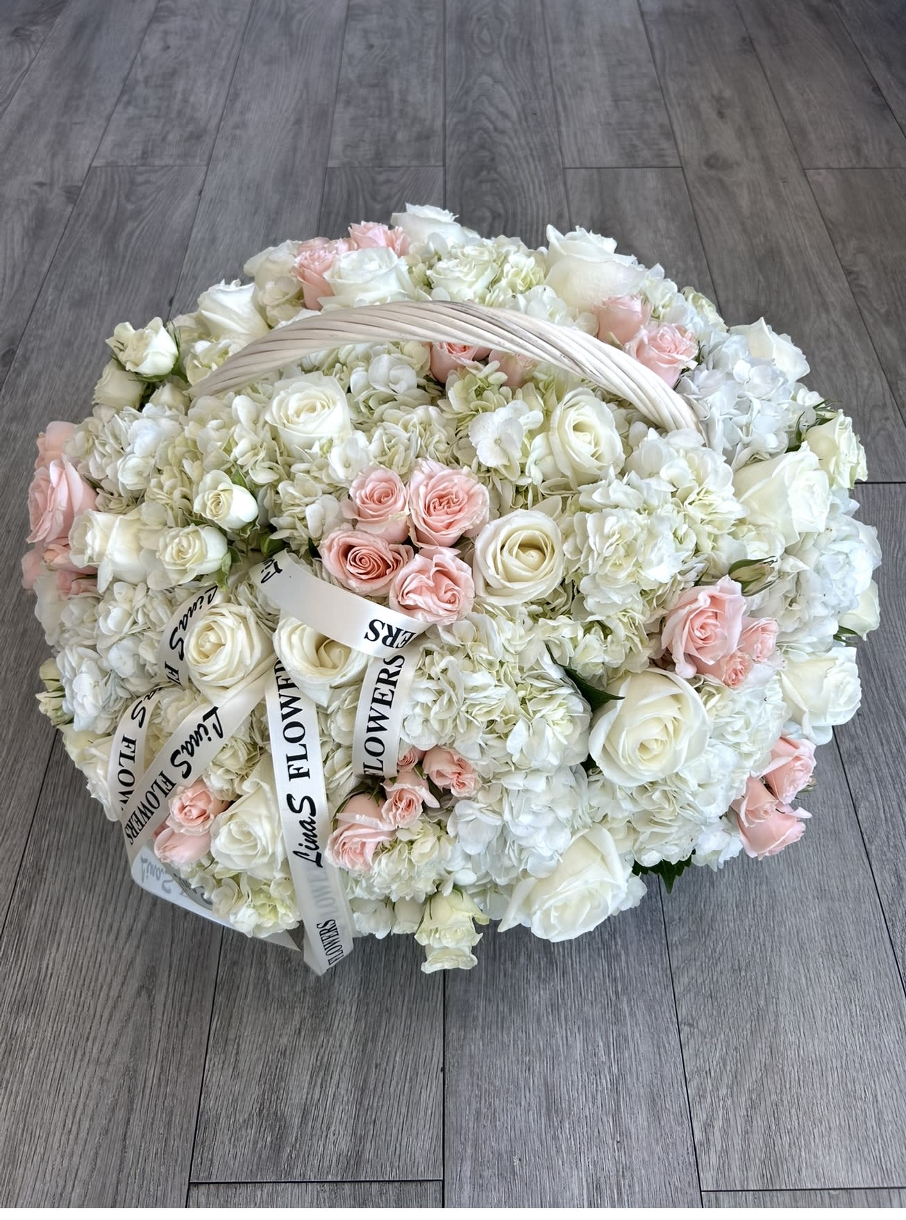 White Hydrangeas   White Hydrangeas  - Delicate bouquet of white hydrangeas and pink spray roses, creating a soft and romantic blend of freshness and charm.