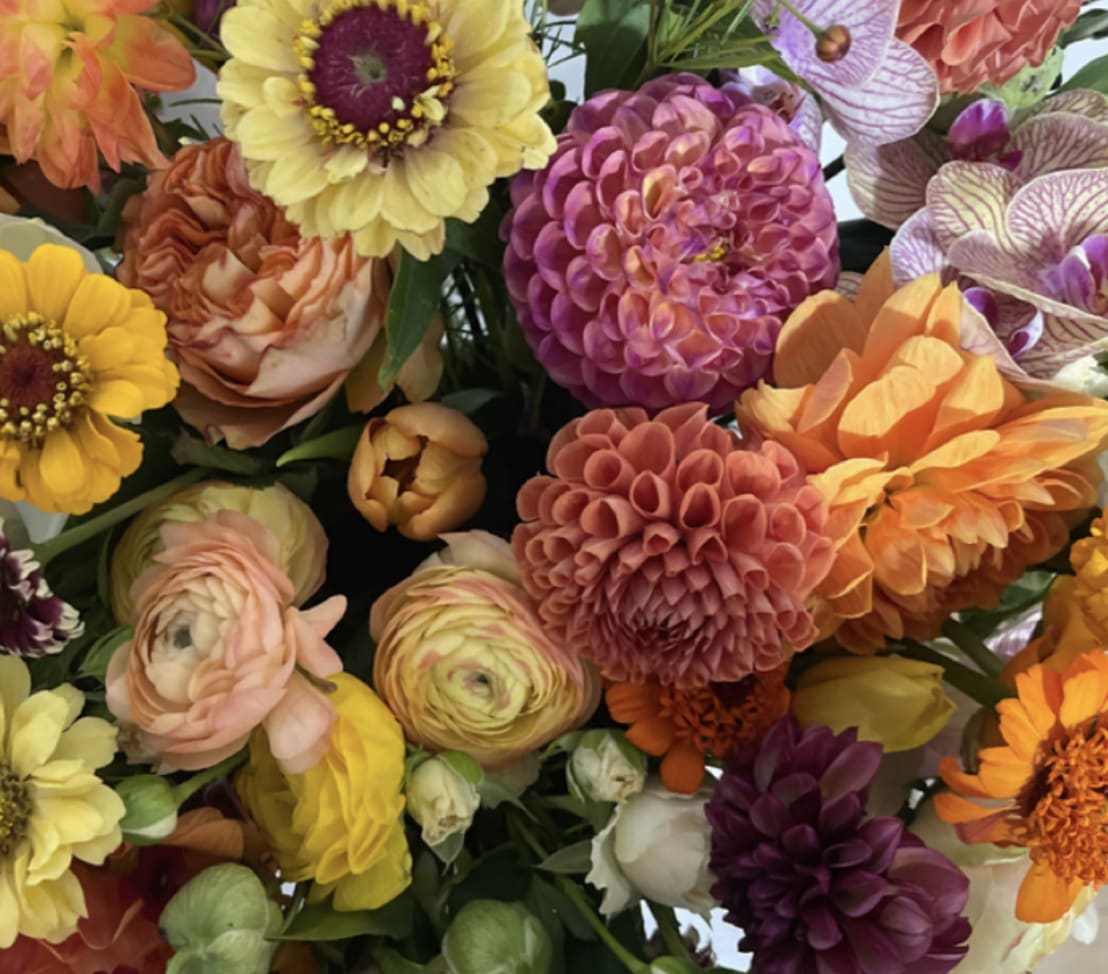 Designer's Choice - Fall Designer's Choice - Fall - Floral arrangement in seasonal fall hues - yellows, orange, peach, magenta, fuchsia, burgundy, etc. Each Designer's Choice vase arrangement will be one of a kind and consist of fresh, seasonal flowers. The arrangement depicted in the photo is just one example of our Designer's Choice - Fall design. Actual arrangement may vary in terms of flower type, color scheme, and overall design depending on seasonal and local availability - but will be similar in size and include flowers of equal value. Standard - 5"x5" Vase Deluxe - 6"x6" Vase Premium - 7"x7" Vase