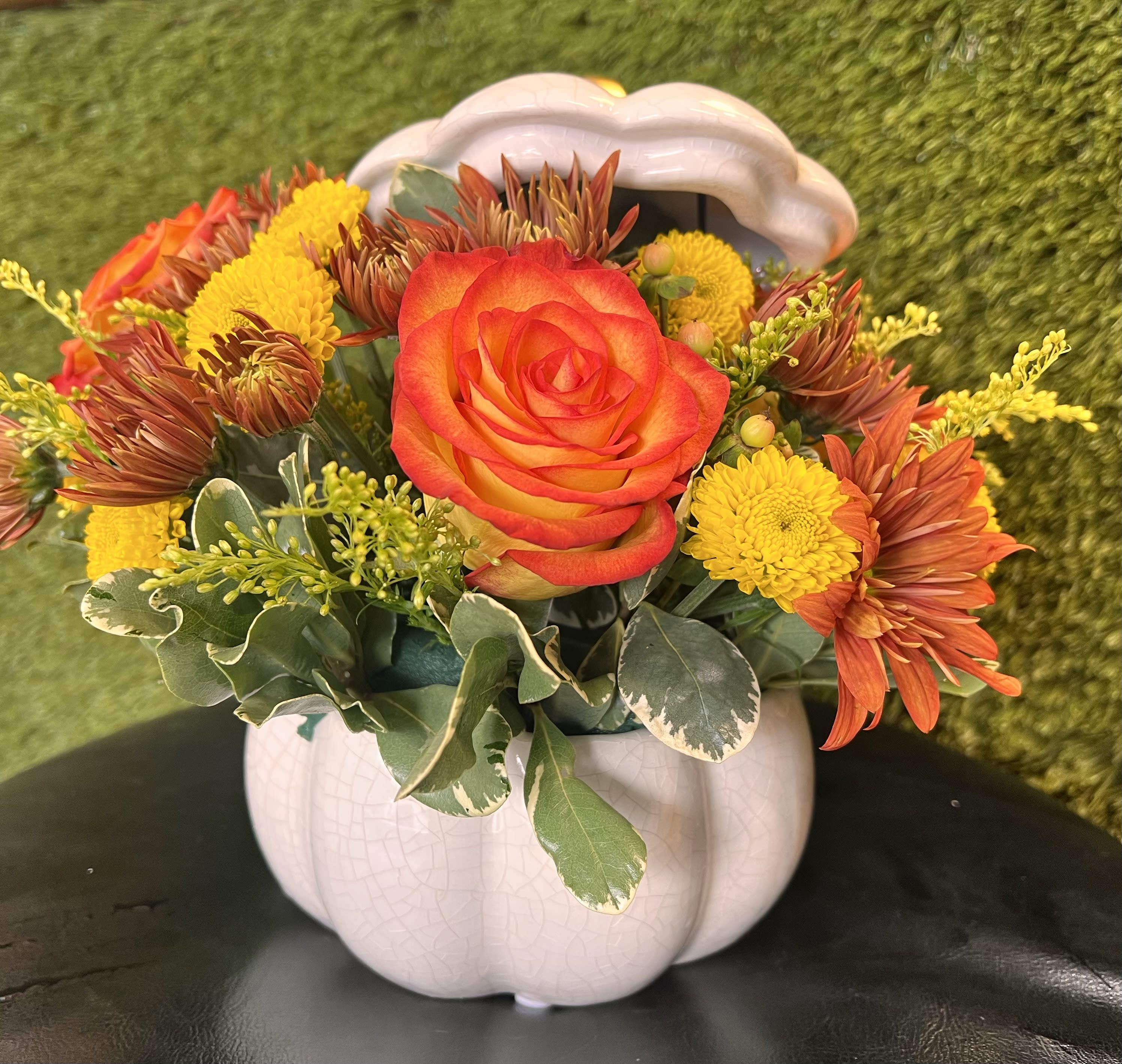 White Crackled Pumpkin  White Crackled Pumpkin  - Crackle white ceramic pumpkin. (Cookie jar) with Orange Roses, Solidago, Button Pom Yellow, Hypericum , Daisy Pom, And Pittosporum