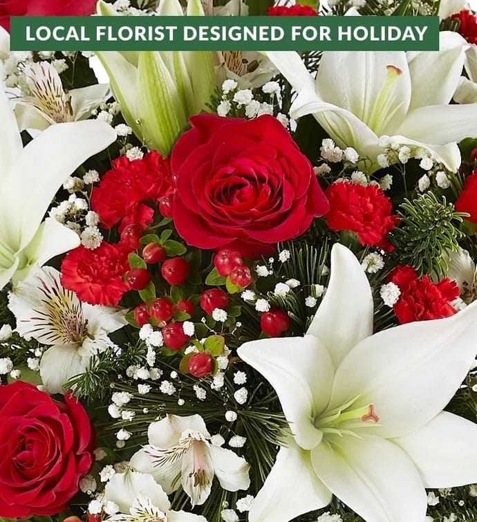 Holiday Florist Choice with vase Holiday Florist Choice with vase - Looking for a truly original way to delivery joy this Christmas? We’ve got just the gift. Elida’s Choice Bouquet for the Holidays is beautifully hand-arranged by our skilled expert florist so that it’s completely unique, and a great value at any size. Our florist puts her passion and creativity into your holiday gift, using only the freshest flowers available. Let us craft a special arrangement for you today!