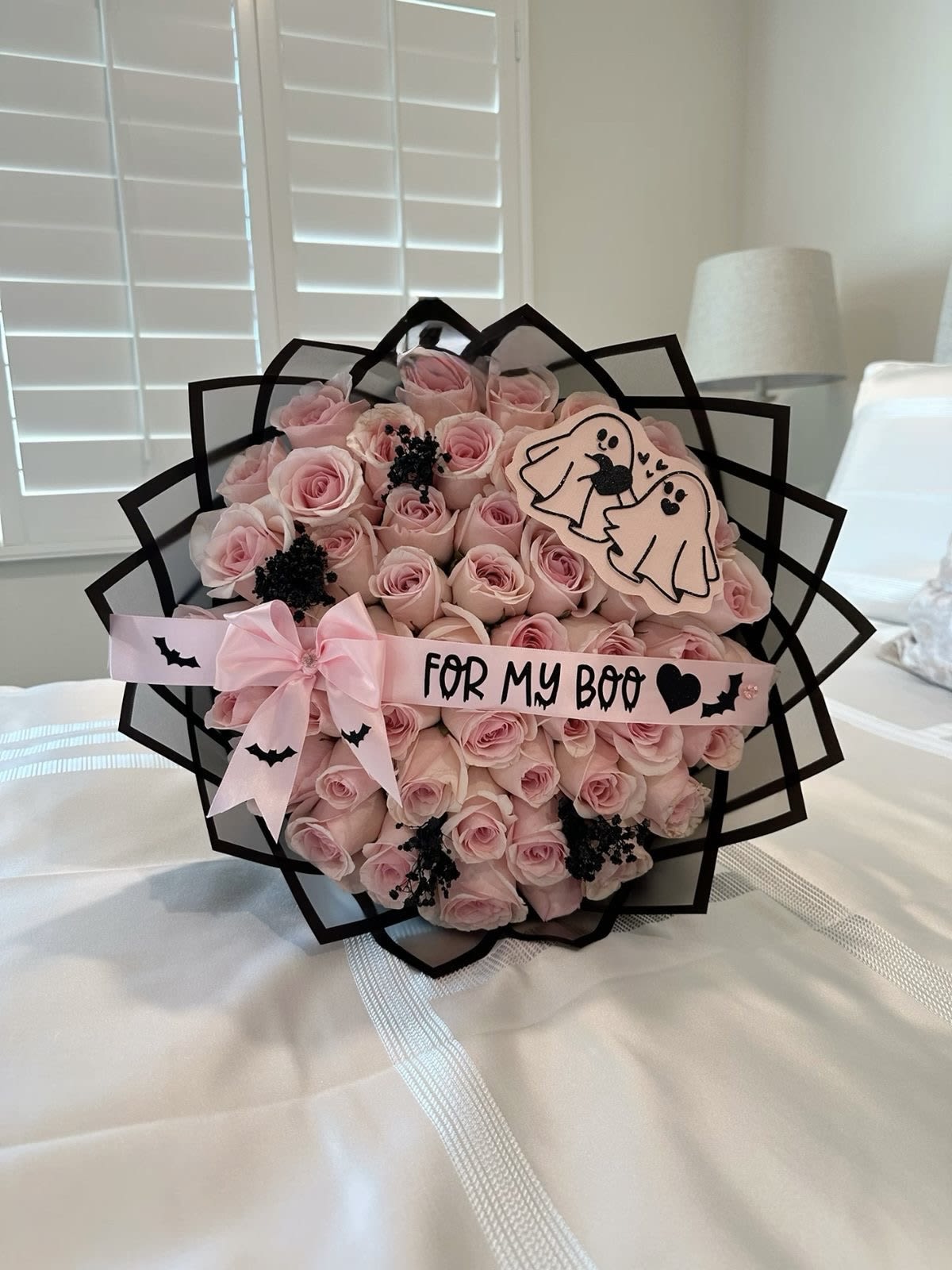 My boo-utifull girl  - Bouquet made up of 50 light pink roses, with ghostly details, decorative flying bats, wrapped in transparent black paper, order today 