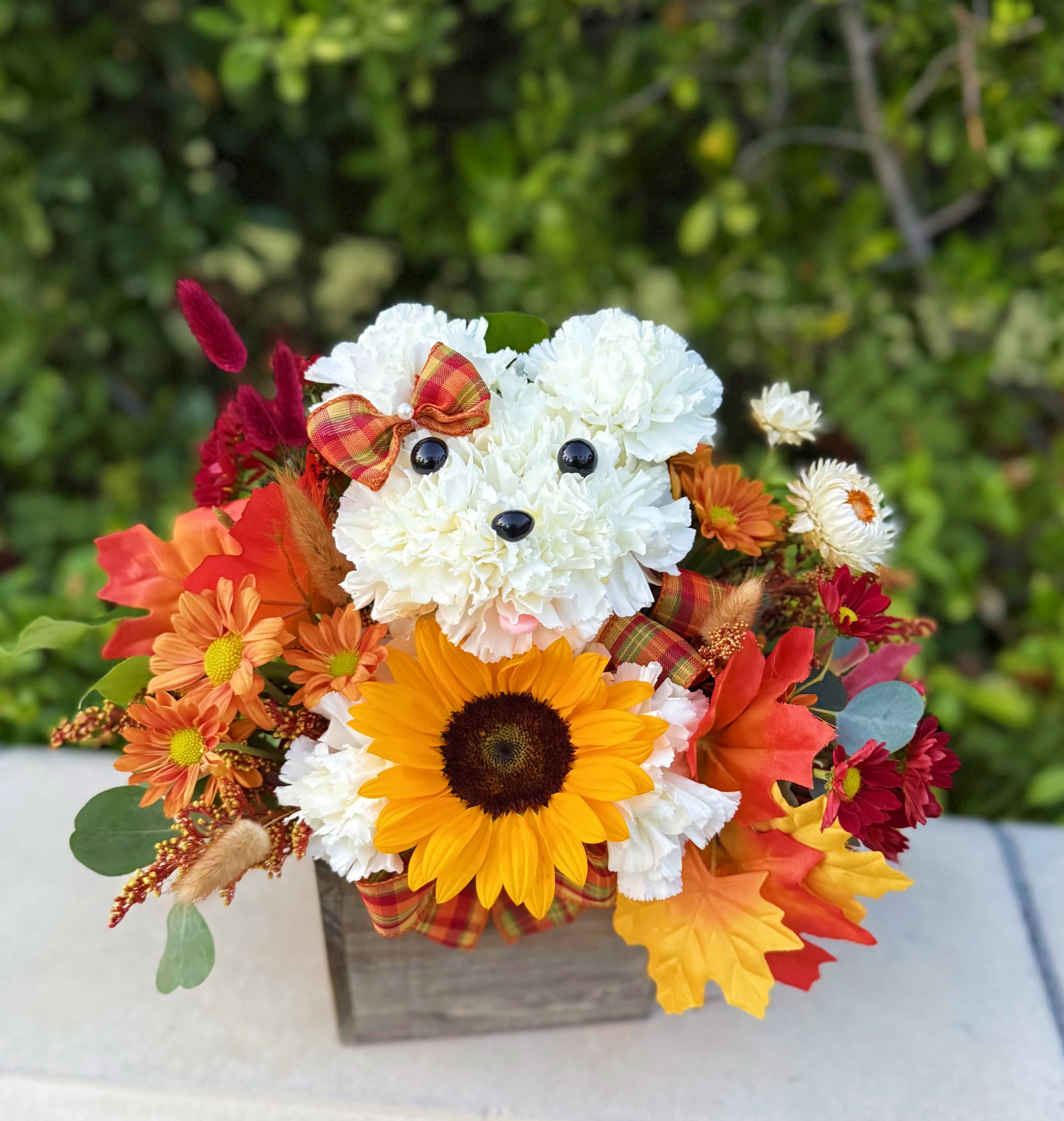 &quot; Welcome Autumn &quot;  Floral Puppy  - Beautiful floral puppy designed with premium flowers in season. It's accented with a beautiful sunflower   Medium size  Autumn colors  It's beautiful. Share Joy with Flowers.