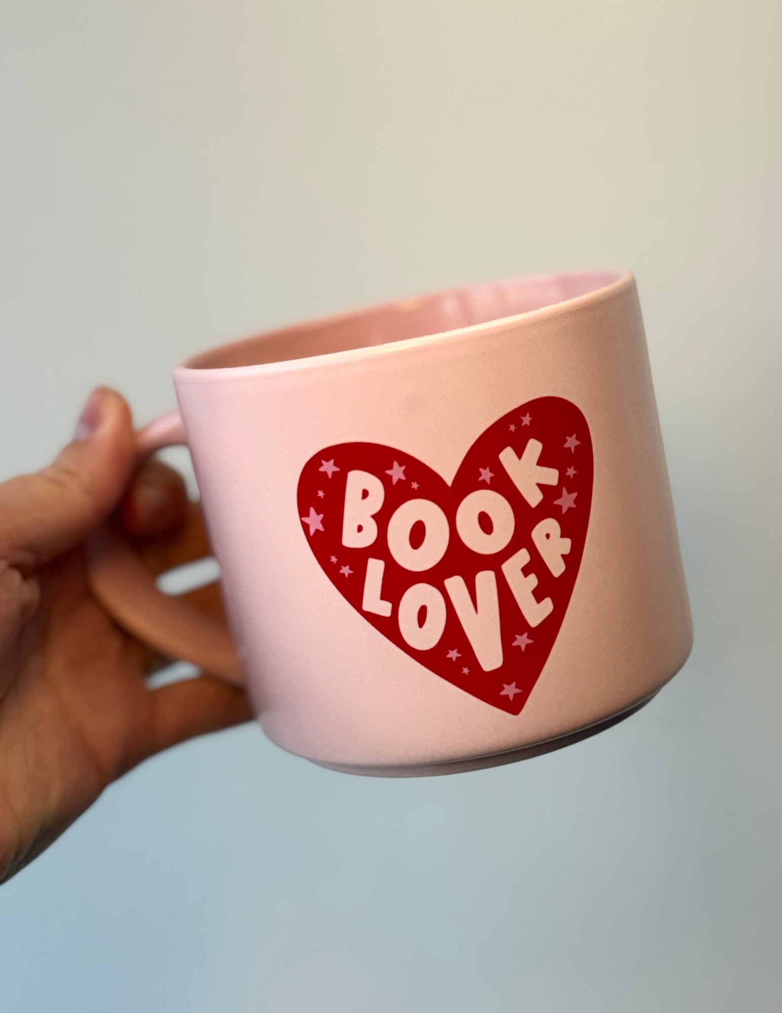 BOOK LOVER COFEE MUG - Complete your flower arrangement with a coffee mug! This thoughtful addition makes your gift even more memorable. 