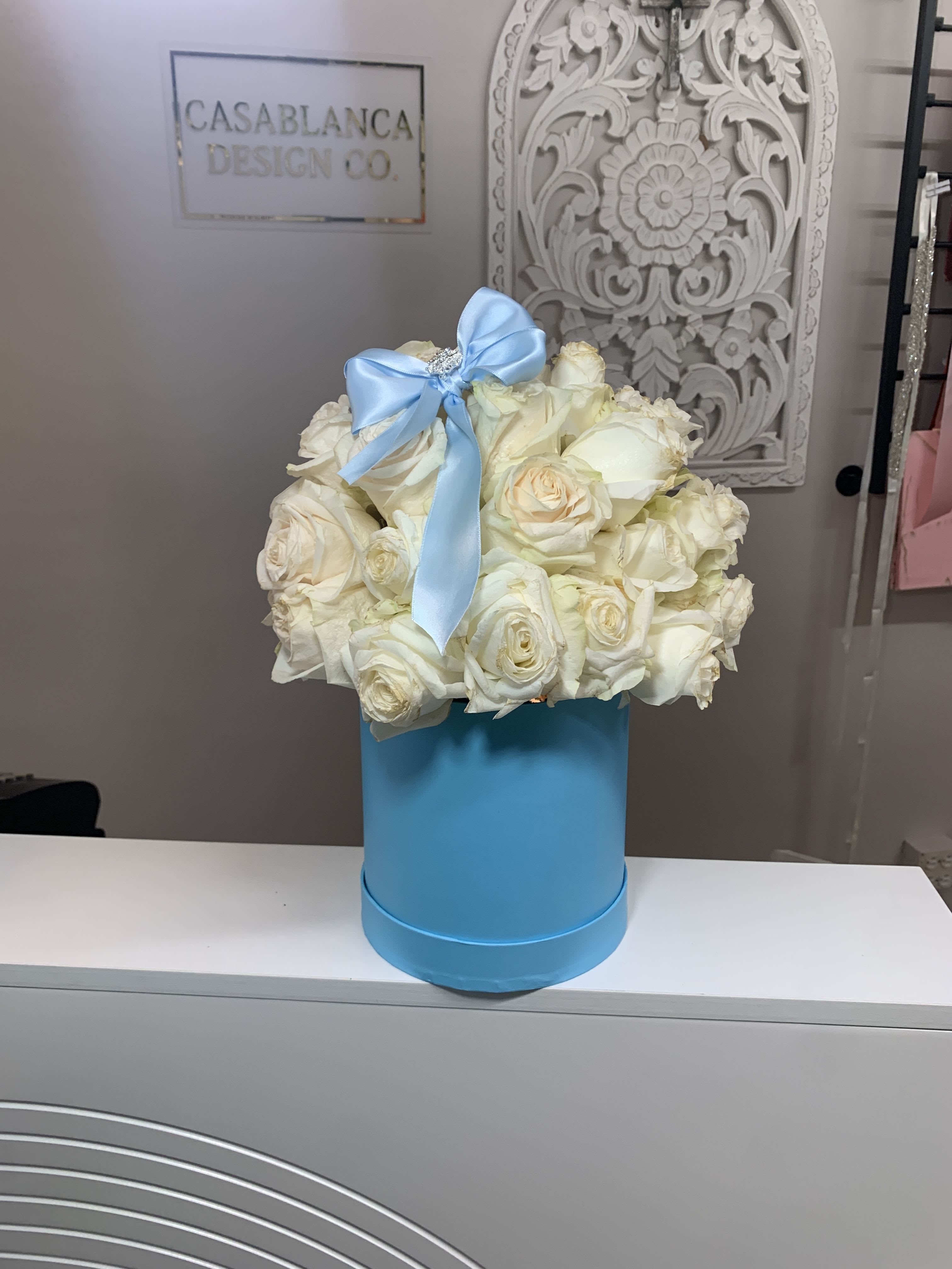 Cinderella - White roses in a light blue box with a light blue bow 