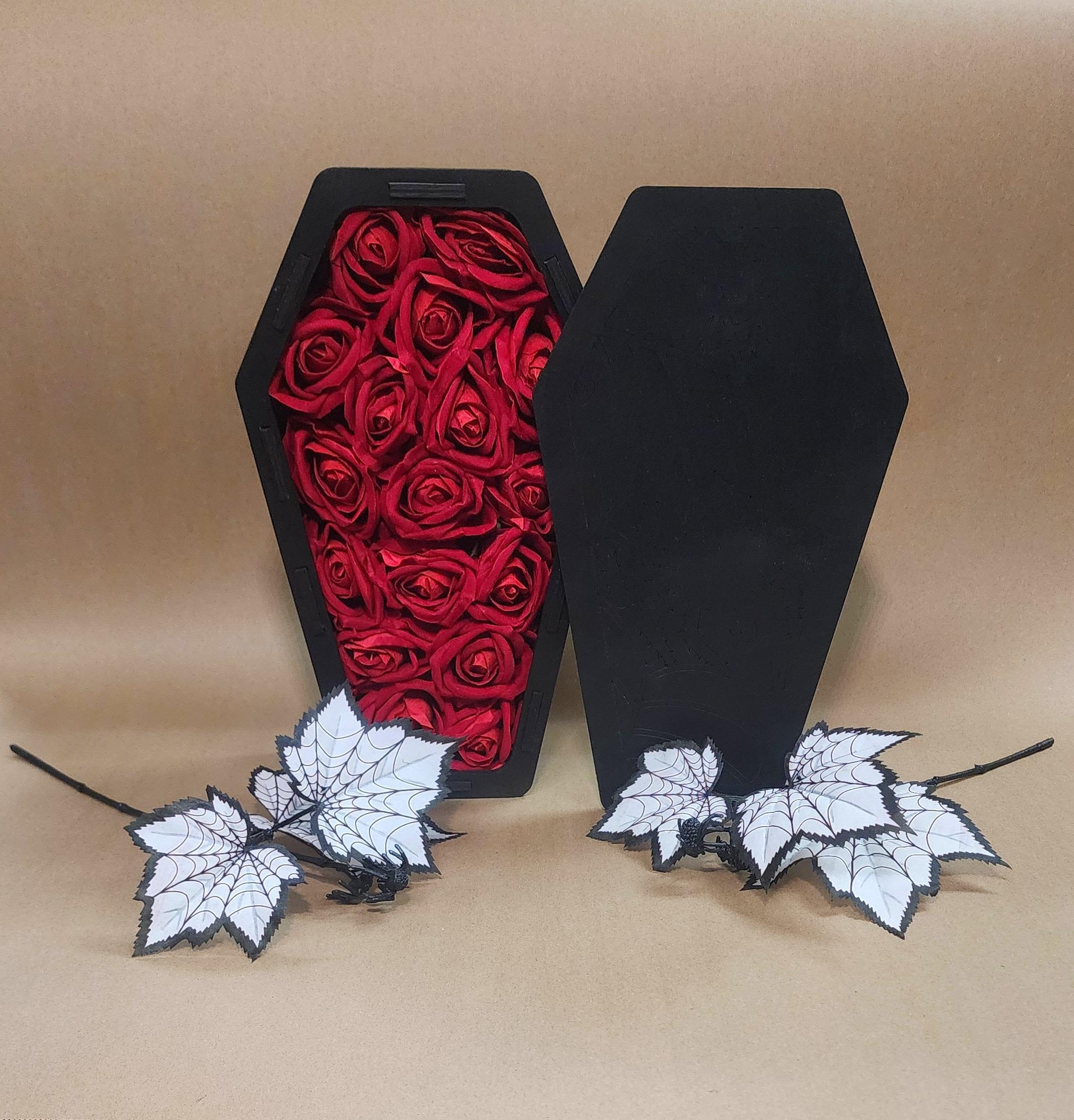 Halloween Coffin Arrangement  - This Spooky Cute Arrangement is Perfect for Halloween Anniversaries or for that special Spooky person in you're life.   APPROX: 13&quot;H x 7&quot;W x 3 1/2&quot; D 