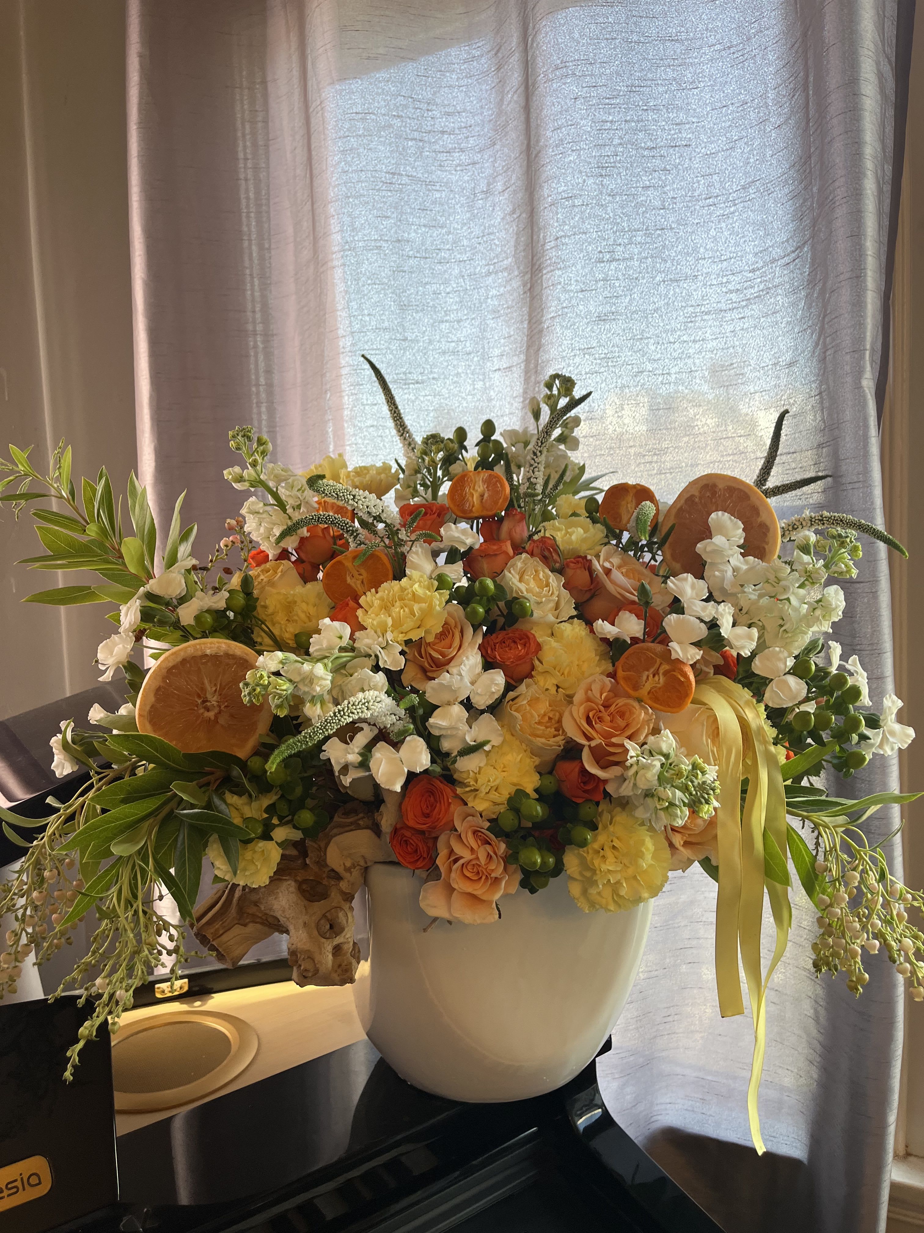 Citrus Blooms  - Fresh Citrus arrangement mixed with garden roses carnations and a beautiful branch
