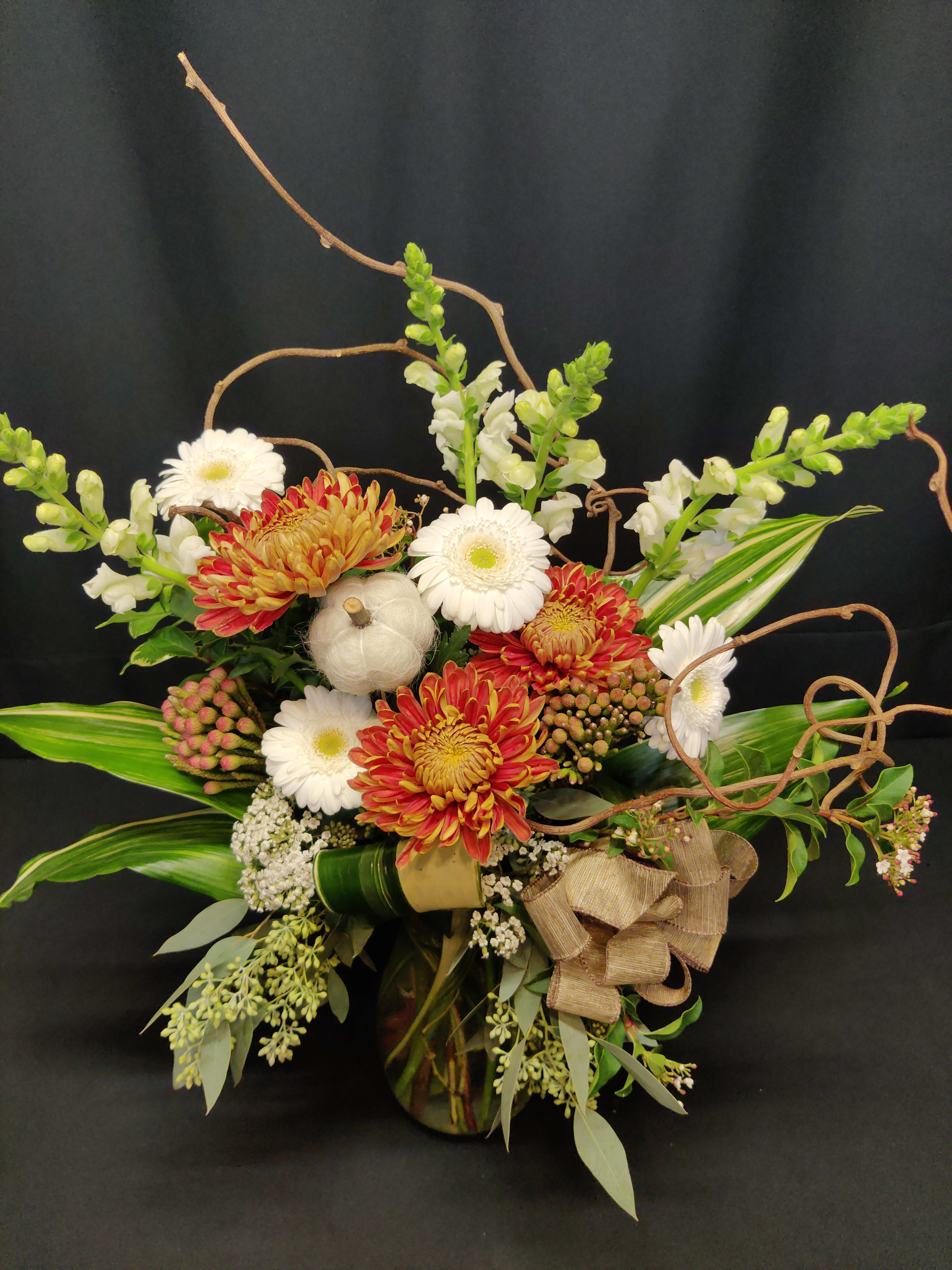 Neutral Autumn Bouquet Premium - Rich autumn tones are striking against this White bouquet for fall. Accents and flowers will vary. Branches and autumn accents bring this mixed bouquet to life!  Makes a wonderful host or thank you gift.