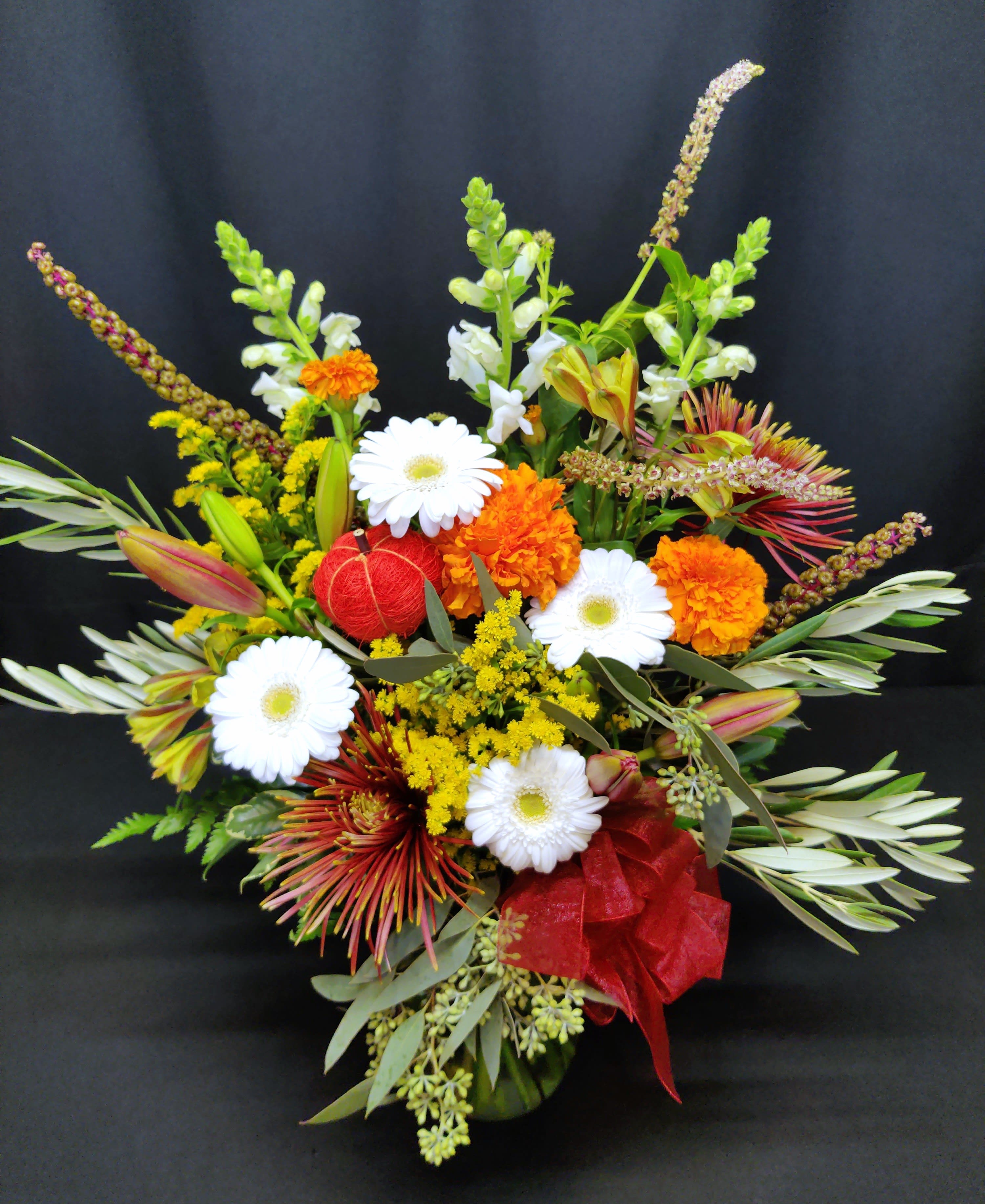 Packed full bouquet Packed full bouquet - Autumn birthday bouquets should be brimming with delightful color reflective of the season's changing. Beautiful premium mums, gerber daisies and so much more. Assortment and colors will vary.