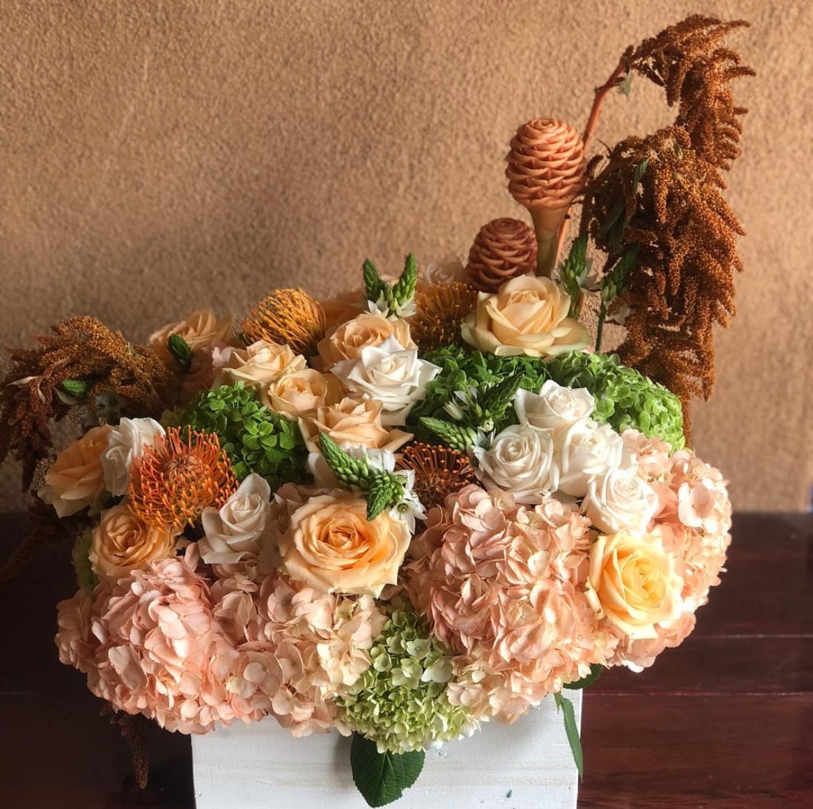 Rustic Rose - white and orange roses with fall seasonal blooms