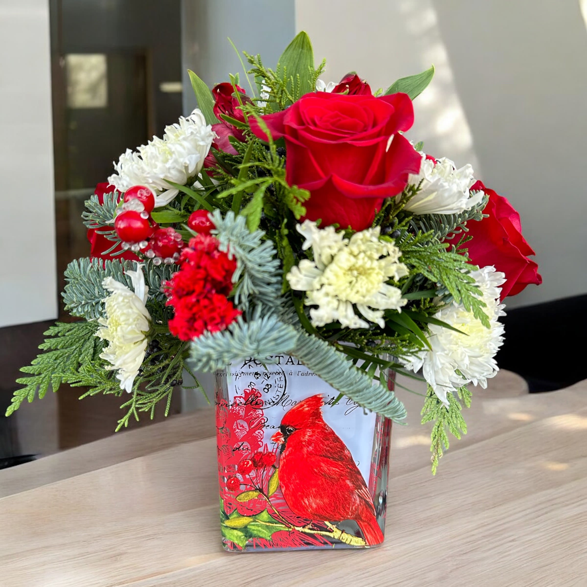 Chaney‘s Christmas 1009 (Cardinal) - Red, White and Green in a Cardinal vase. Fresh cut and always hand arranged with love!