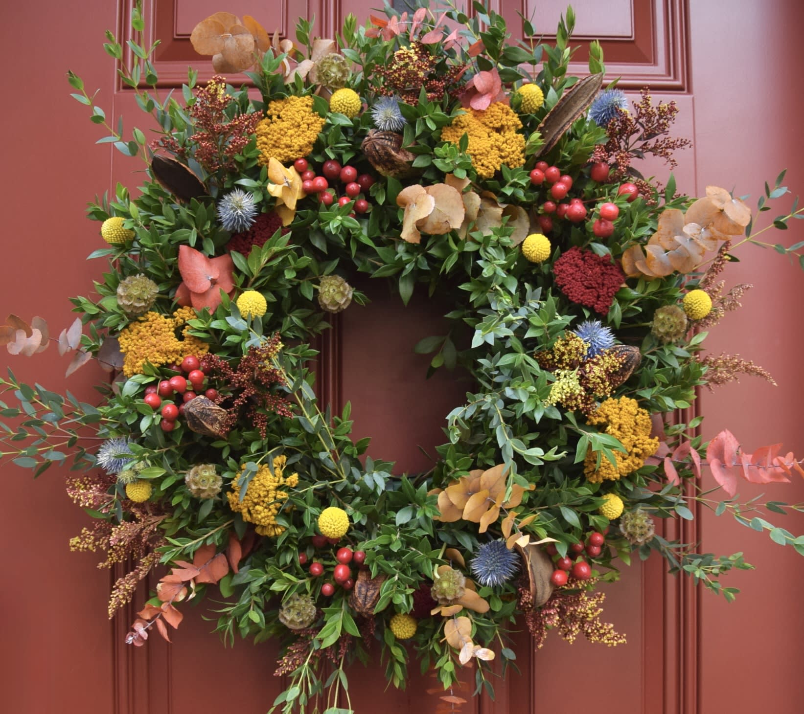 Autumn Wreath with fresh flowers and greens Autumn Wreath with fresh flowers and greens - A beautiful handcrafted fresh autumn wreath for your door. Each customized and made fresh in fall colors. I select a variety of textures, flowers and greens to last longer even when they dry. Please allow 1 week to get all the fresh supplies. Colors and selection of flowers and greens may vary based on the availability.