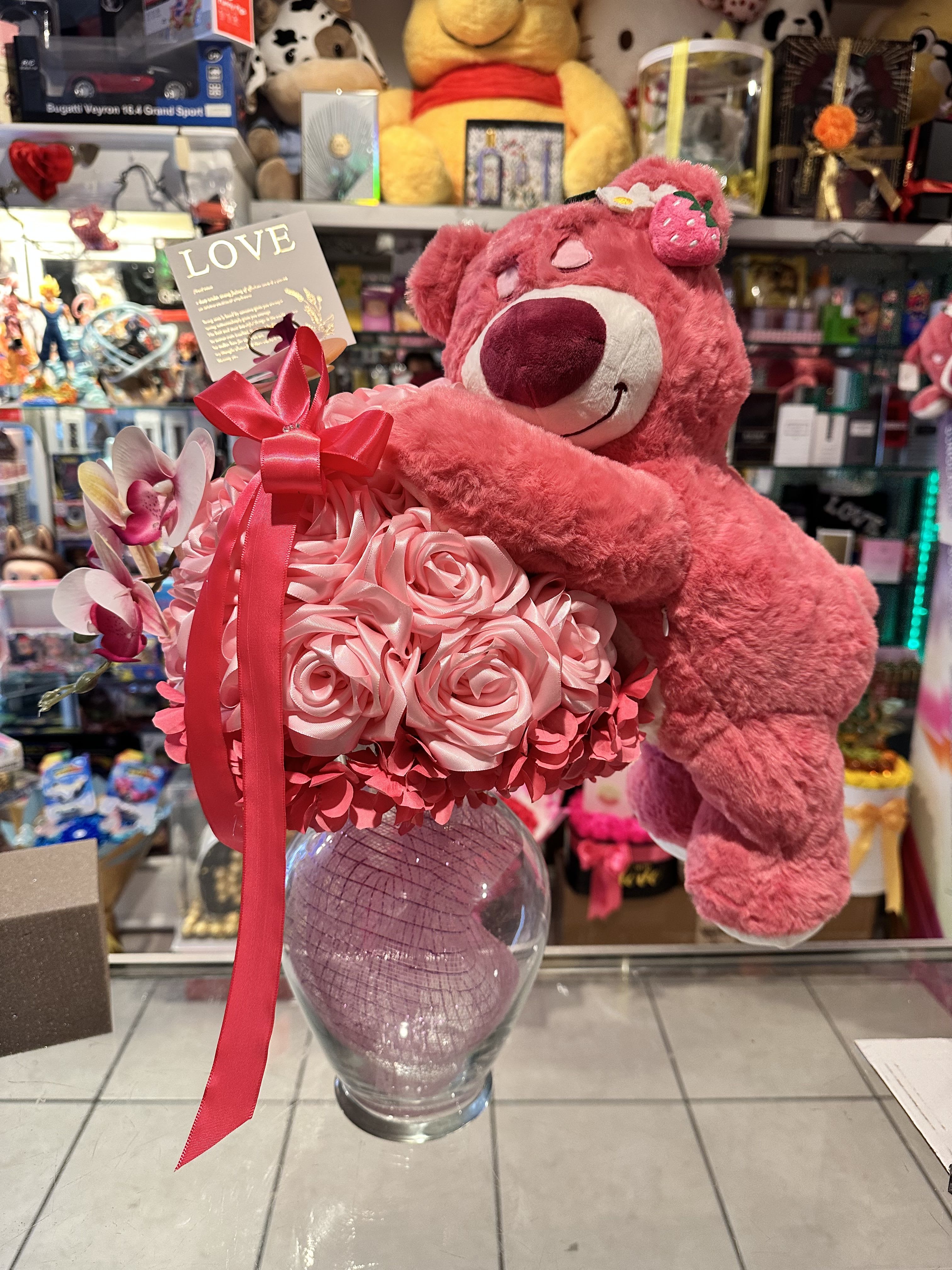 Eternal roses Eternal roses - Beautiful vase with eternal roses of ribbon with a beautiful stuffed animal, ideal for any occasion, artificial flowers.