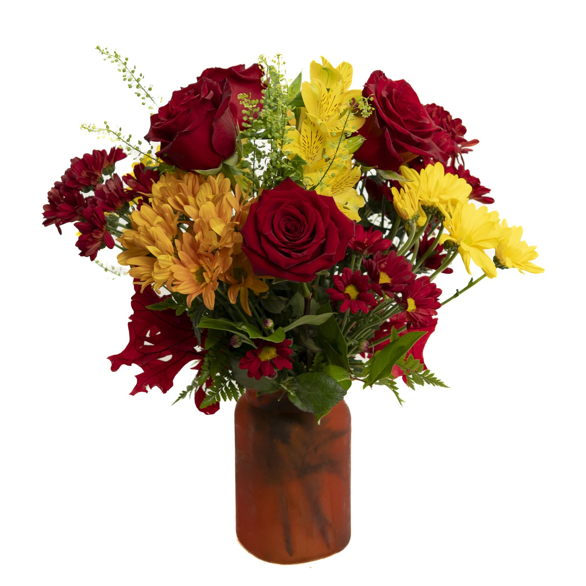 Harvest Glow Bouquet Harvest Glow Bouquet - Celebrate the warmth of the season with the Harvest Glow Bouquet. Featuring rich red roses, golden yellow alstroemeria, vibrant mums, and deep red daisy poms, this arrangement radiates autumn charm. Designed in a rustic orange vase, it makes the perfect gift to brighten any home, holiday table, or special occasion with festive color and cheer.