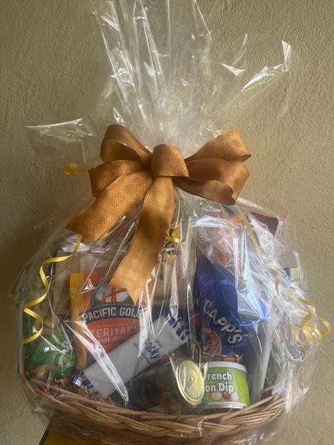 Holiday Gift Baskets for Businesses - Holiday Gift Baskets for Businesses  This holiday season, delight your clients, colleagues, and partners with our thoughtfully curated holiday gift baskets. Each basket is filled with an exquisite selection of gourmet treats, perfect for spreading seasonal cheer. Inside, you’ll find a delicious assortment of:  Truffles: Luxuriously smooth, melt-in-your-mouth chocolate truffles for a rich, indulgent treat.  Cookies: Freshly baked, soft, and perfectly sweetened cookies, including holiday classics.  Candy: A mix of festive, colorful holiday candies that capture the spirit of the season.  Crackers: Savory, crisp crackers to pair beautifully with gourmet cheeses.  Cheese: A selection of high-quality cheeses, perfect for any celebration.  Gourmet Items: Unique, high-end delicacies to surprise and delight even the most discerning palates.  Each basket is beautifully arranged and can be customized to fit your business’s unique style or branding needs. Whether you're looking to express gratitude, strengthen relationships, or spread festive joy, our holiday gift baskets make the perfect corporate gift this season.  Let us help you make a lasting impression with a holiday gift that’s as special by