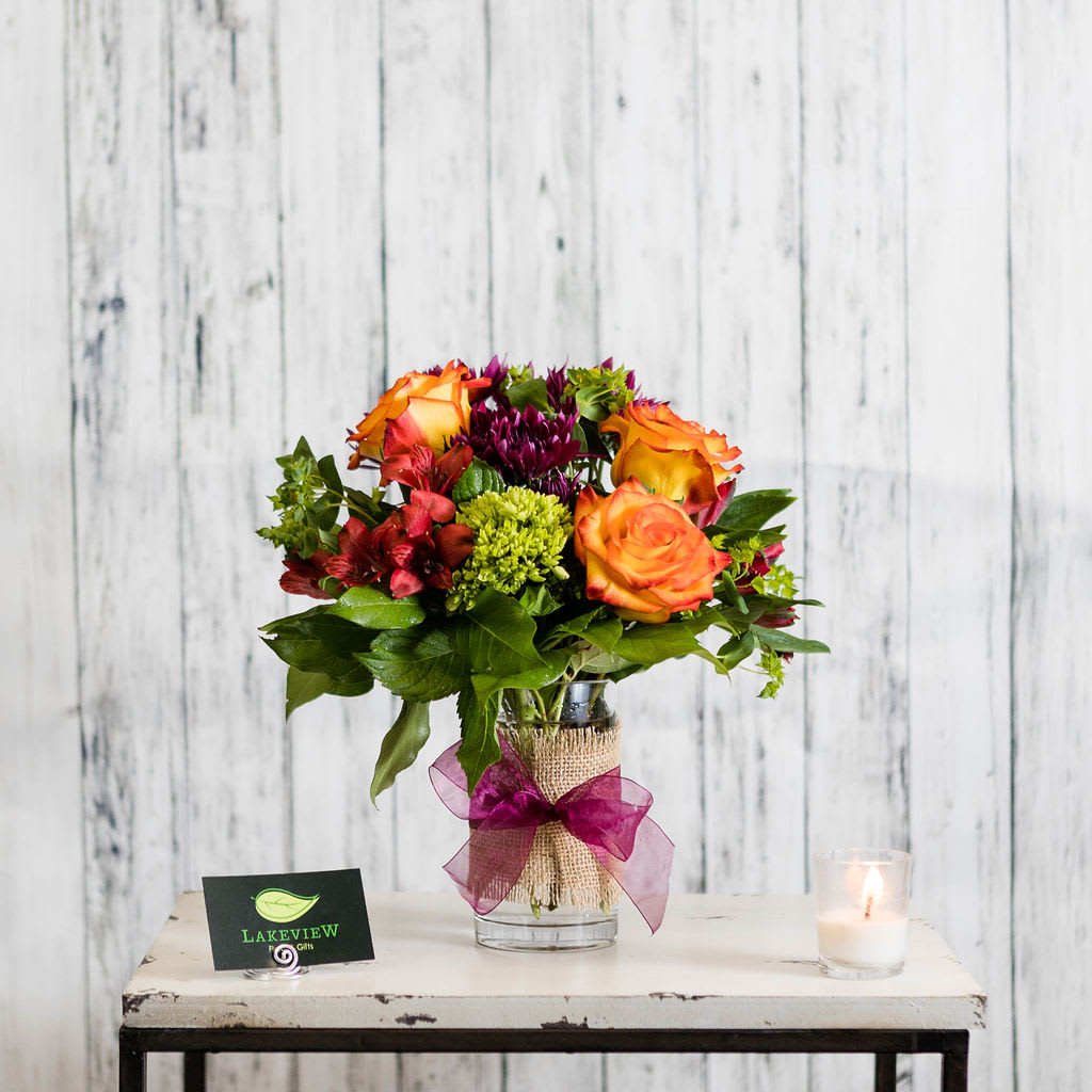 Festival Festival - Tell them just how special they are to you with an extra- special arrangement of vibrant novelty roses, hydrangeas and alstroemeria. It's sure to be a hit! Approximate Dimensions: 13" H x 10" W