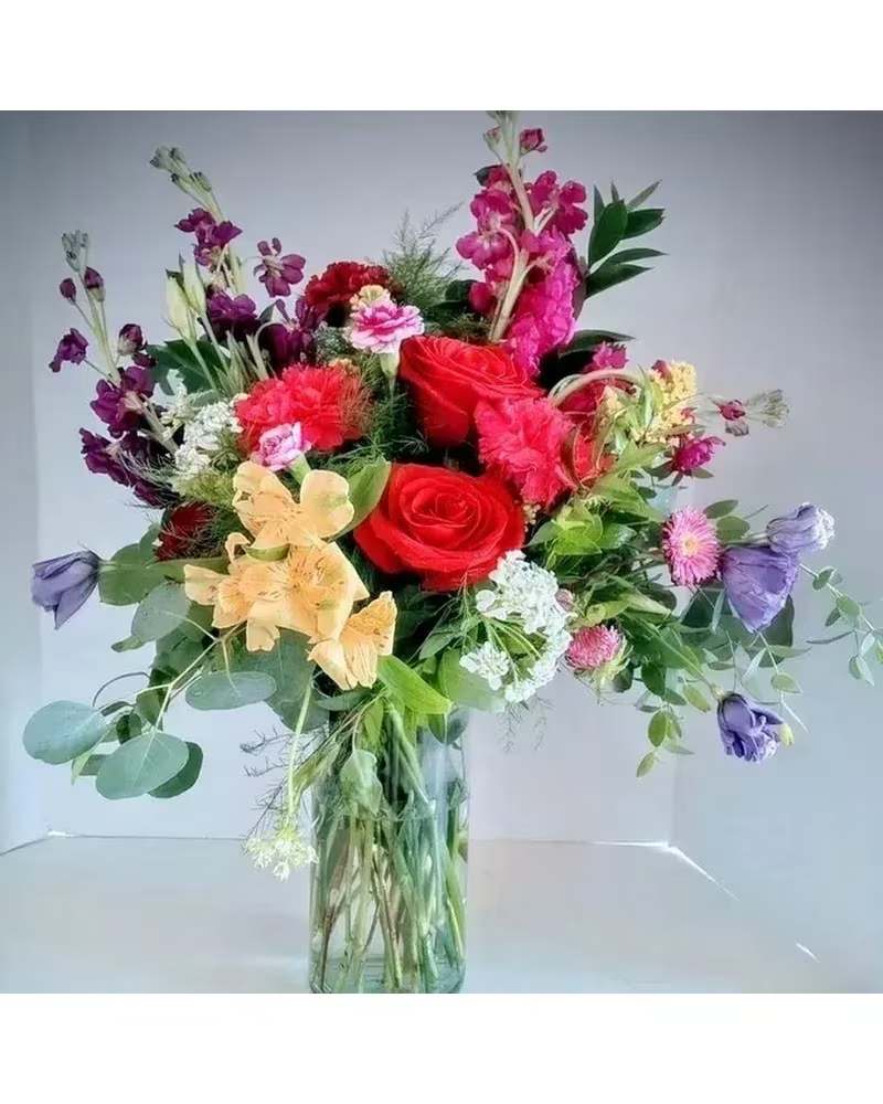 Juliette - This combination of jewel tones and sweet flowers would be most welcome when delivered to that special person for occasion. Let today be the day! 