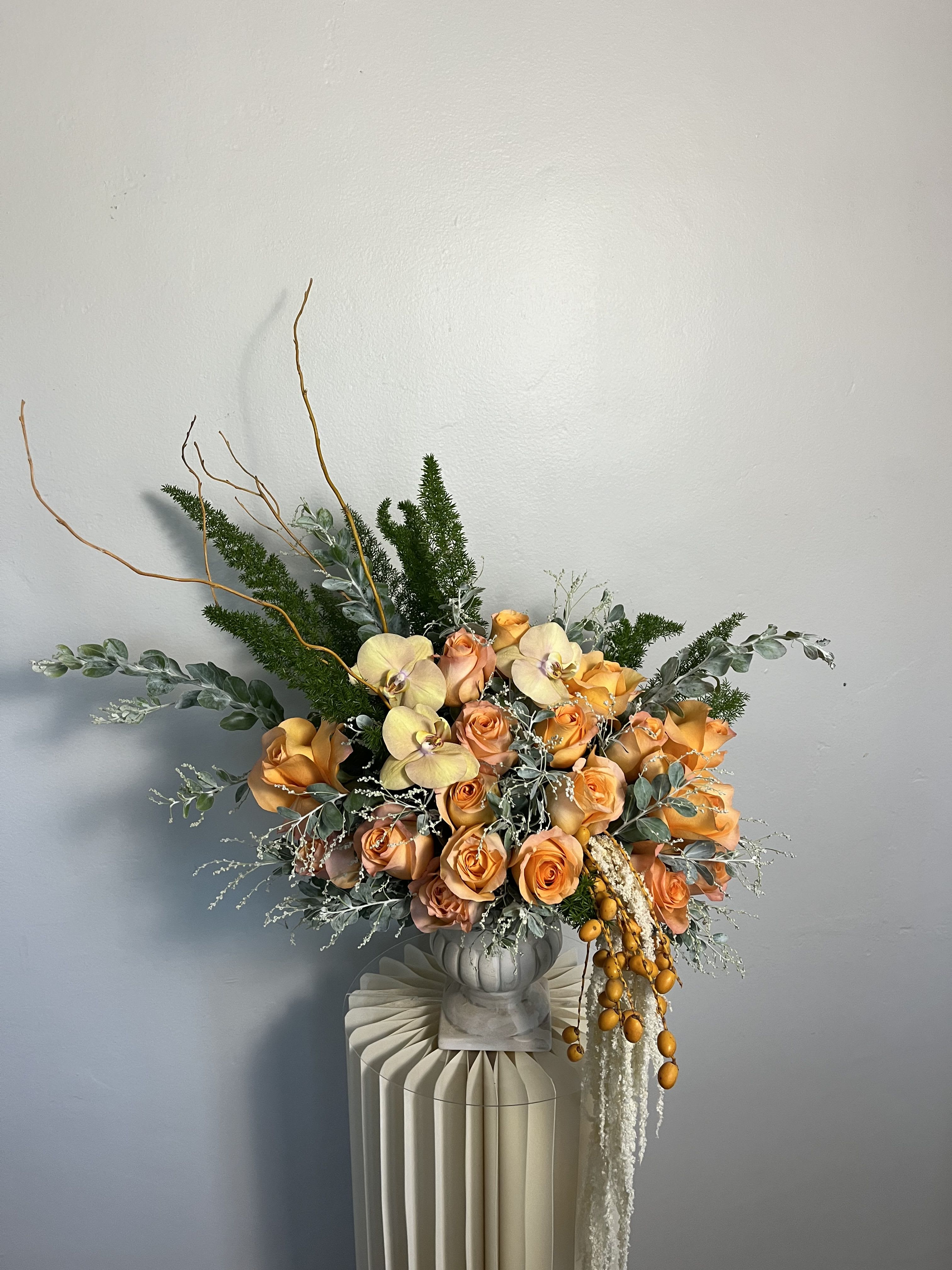 Soft Whippers  - Orange roses with buttery yellow orchids