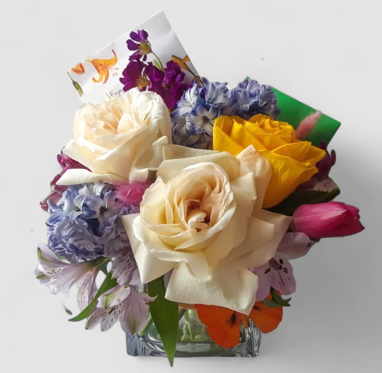 Sweet Friend Bouquet Designer's Choice - Send this cutie sweet friend bouquet today to send a smile with it's pretty mixed blossoms of that day roses and more arranged in a modern glass cube style vase. Perfect to cheer them up. All of my bouquets are always made extra special and unique each time. Send happiness.